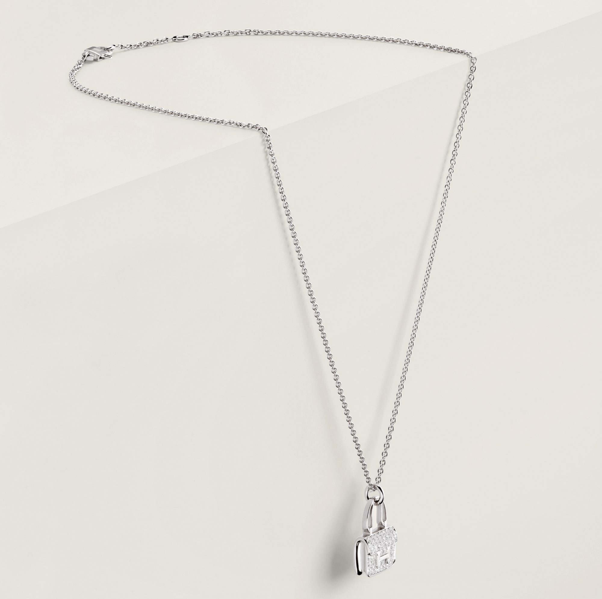 HERMÈS AMULETTES CONSTANCE PENDANT WHITE GOLD WITH DIAMONDS