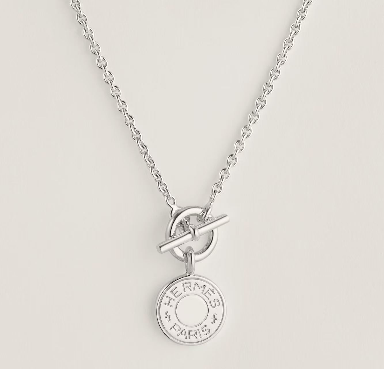 HERMÈS AMULETTES EX-LIBRIS PENDANT SILVER