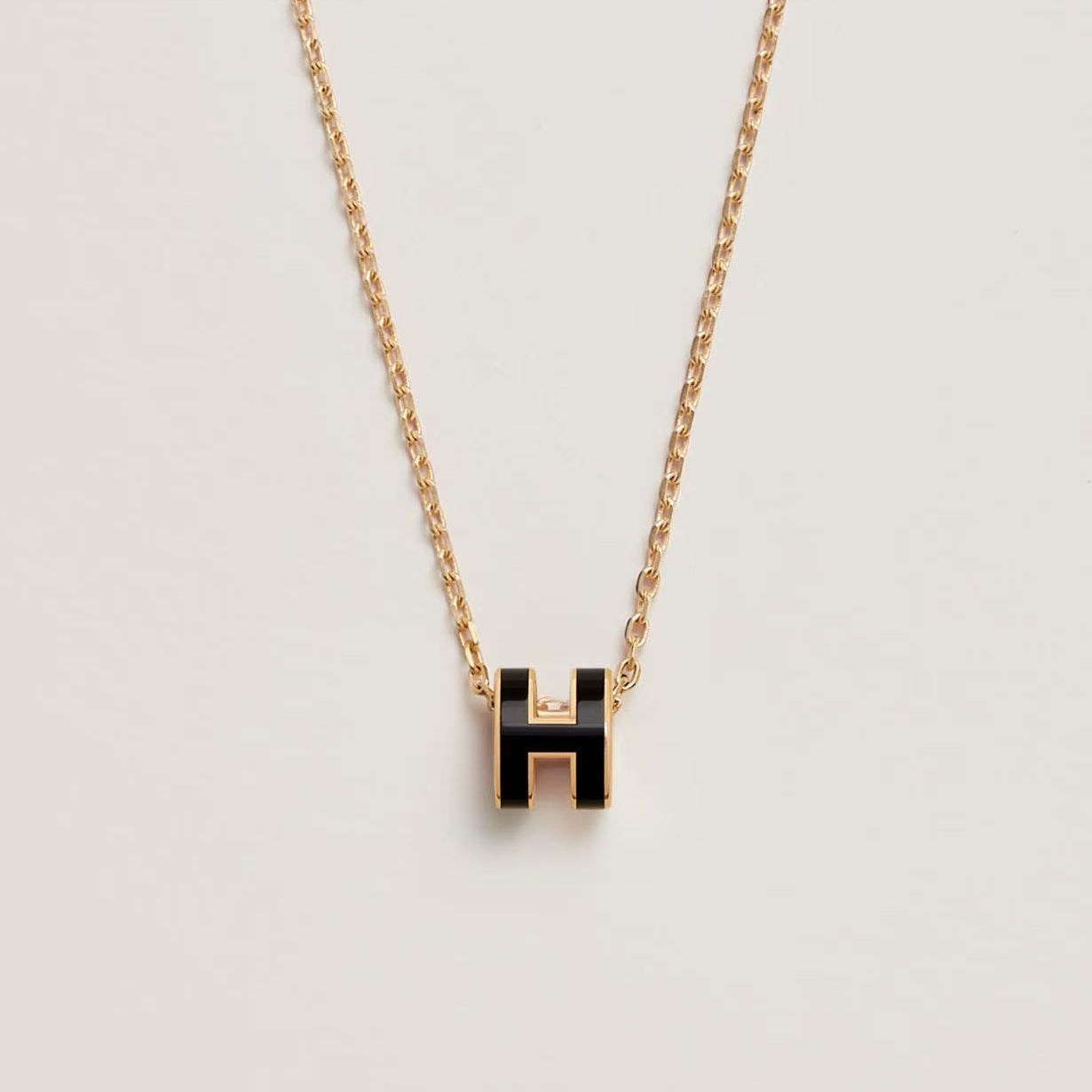 HERMÈS H POP NECKLACE BLACK GOLD