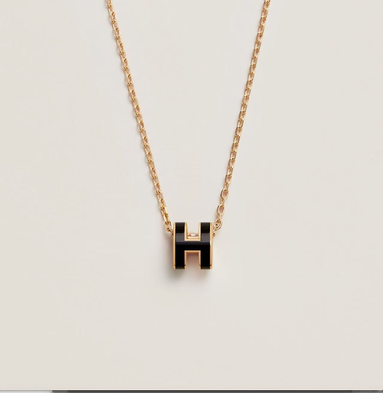HERMÈS H POP NECKLACE BLACK GOLD