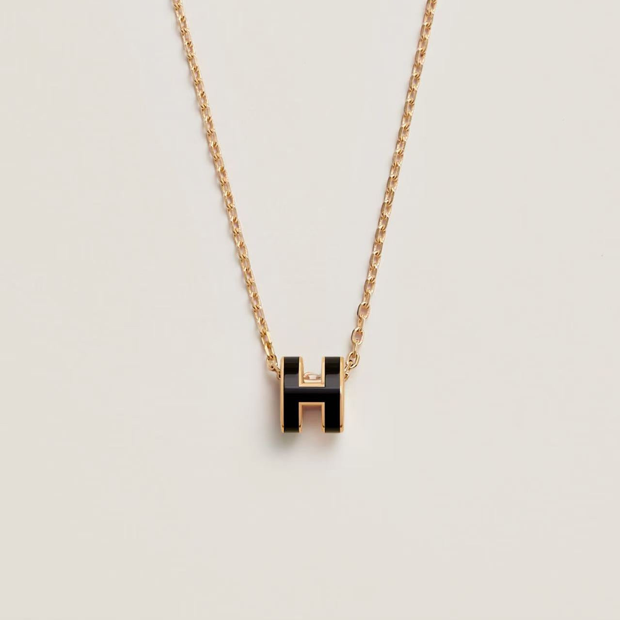 HERMÈS H POP NECKLACE BLACK GOLD