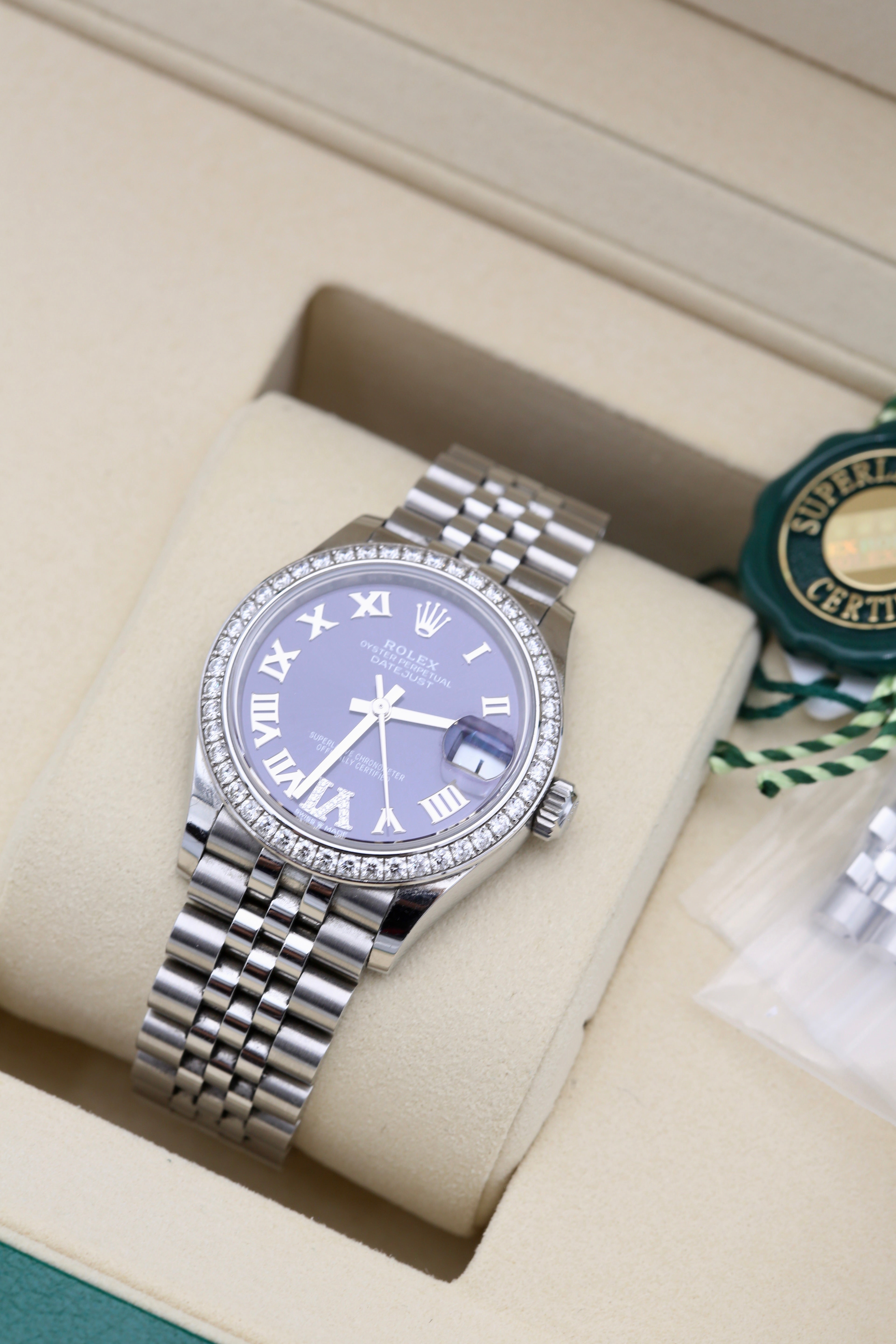 ROLEX DATEJUST 31 WHITE GOLD WITH DIAMONDS AUBERGINE DIAL 2026