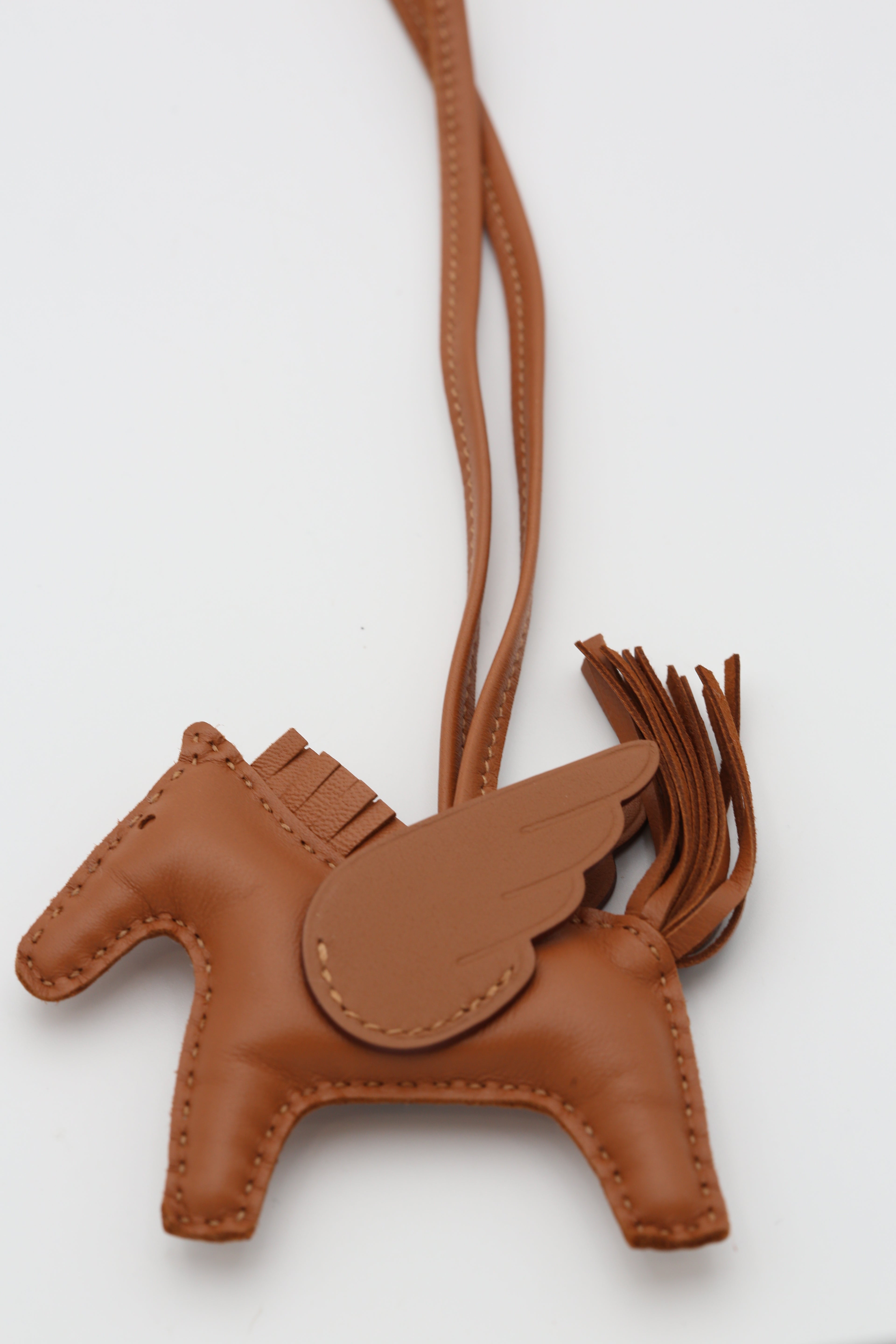 HERMÈS RODEO PEGASE PM CHARM GOLD