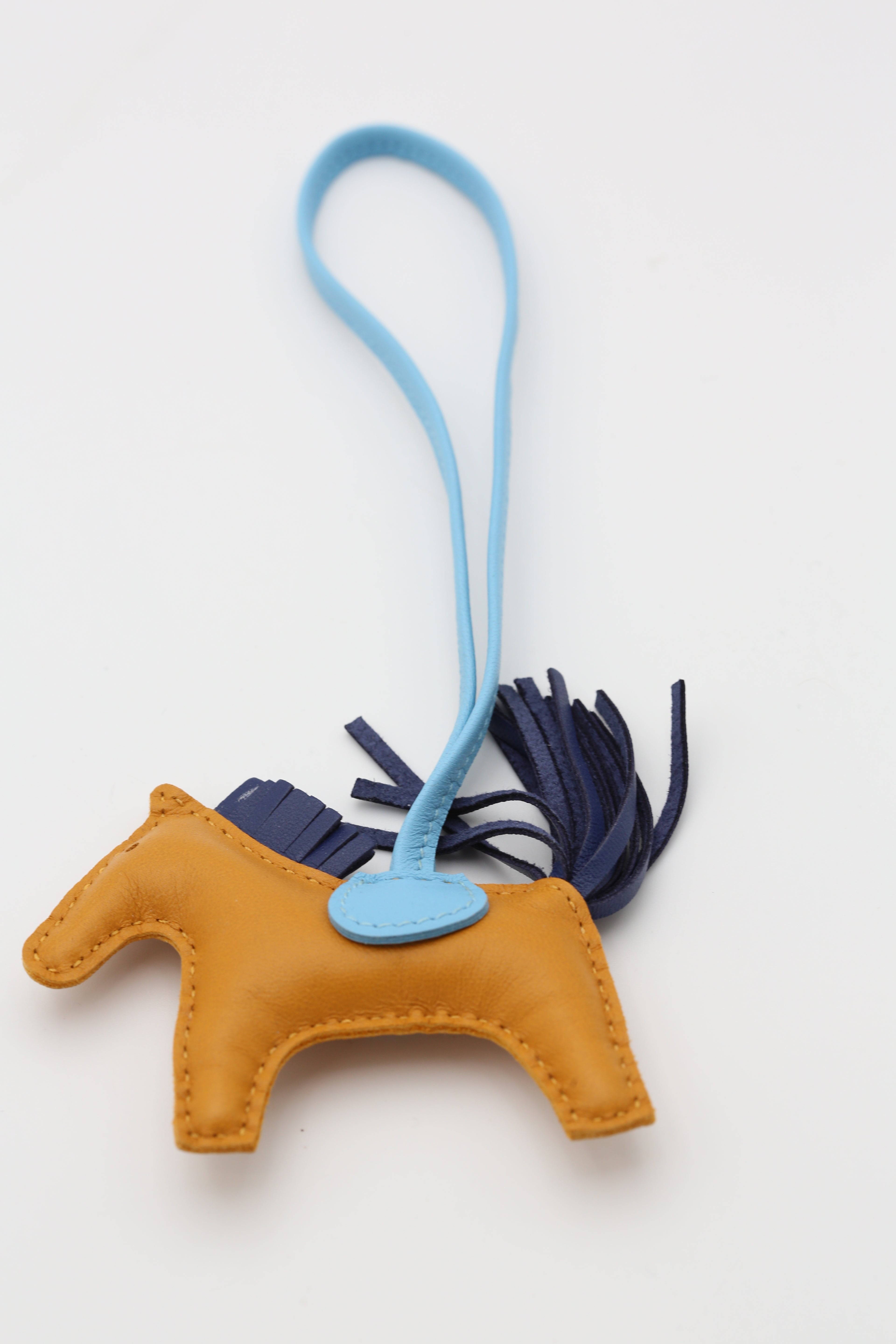 HERMÈS RODEO PEGASE PM CHARM GOLD/BLEU