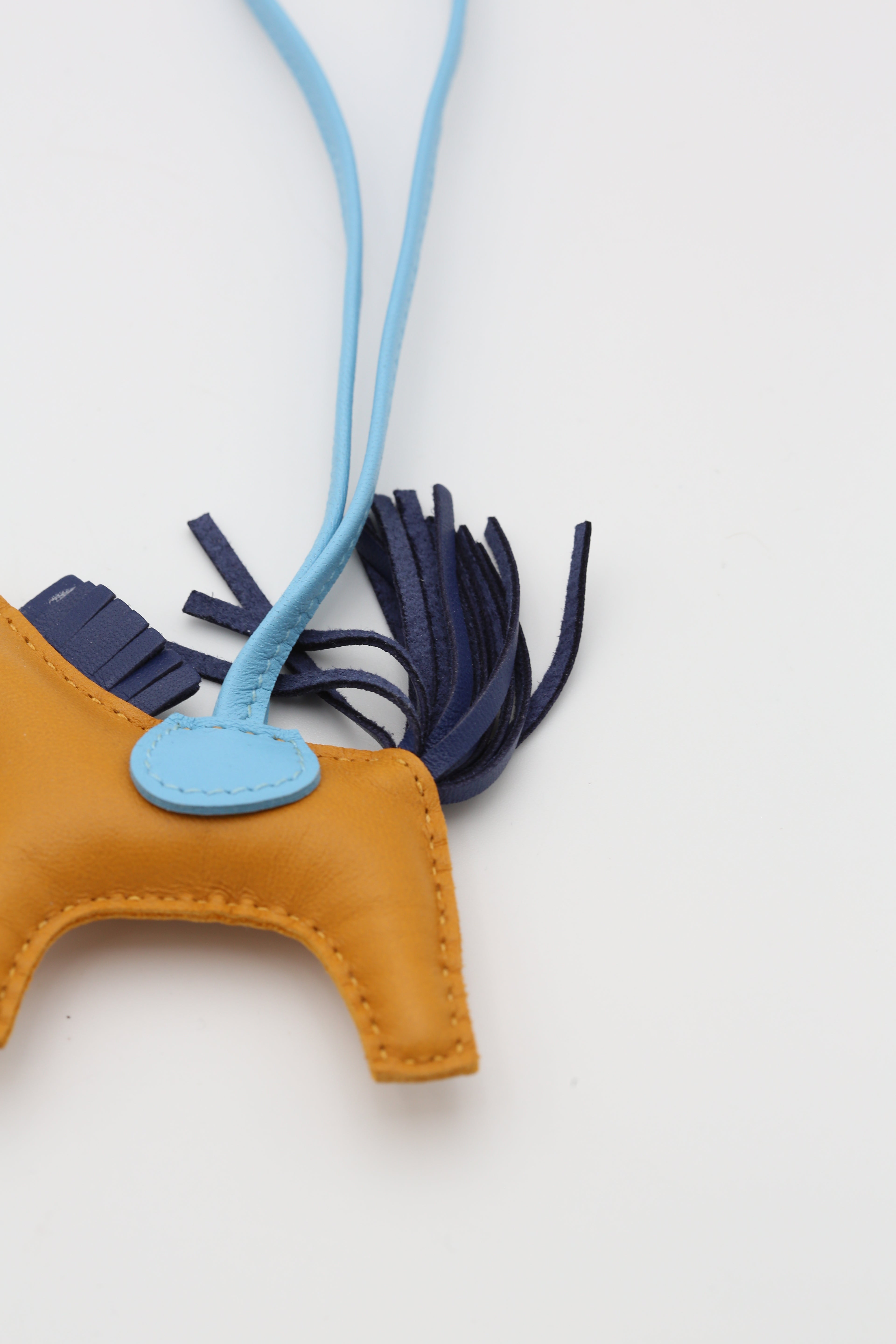 HERMÈS RODEO PEGASE PM CHARM GOLD/BLEU