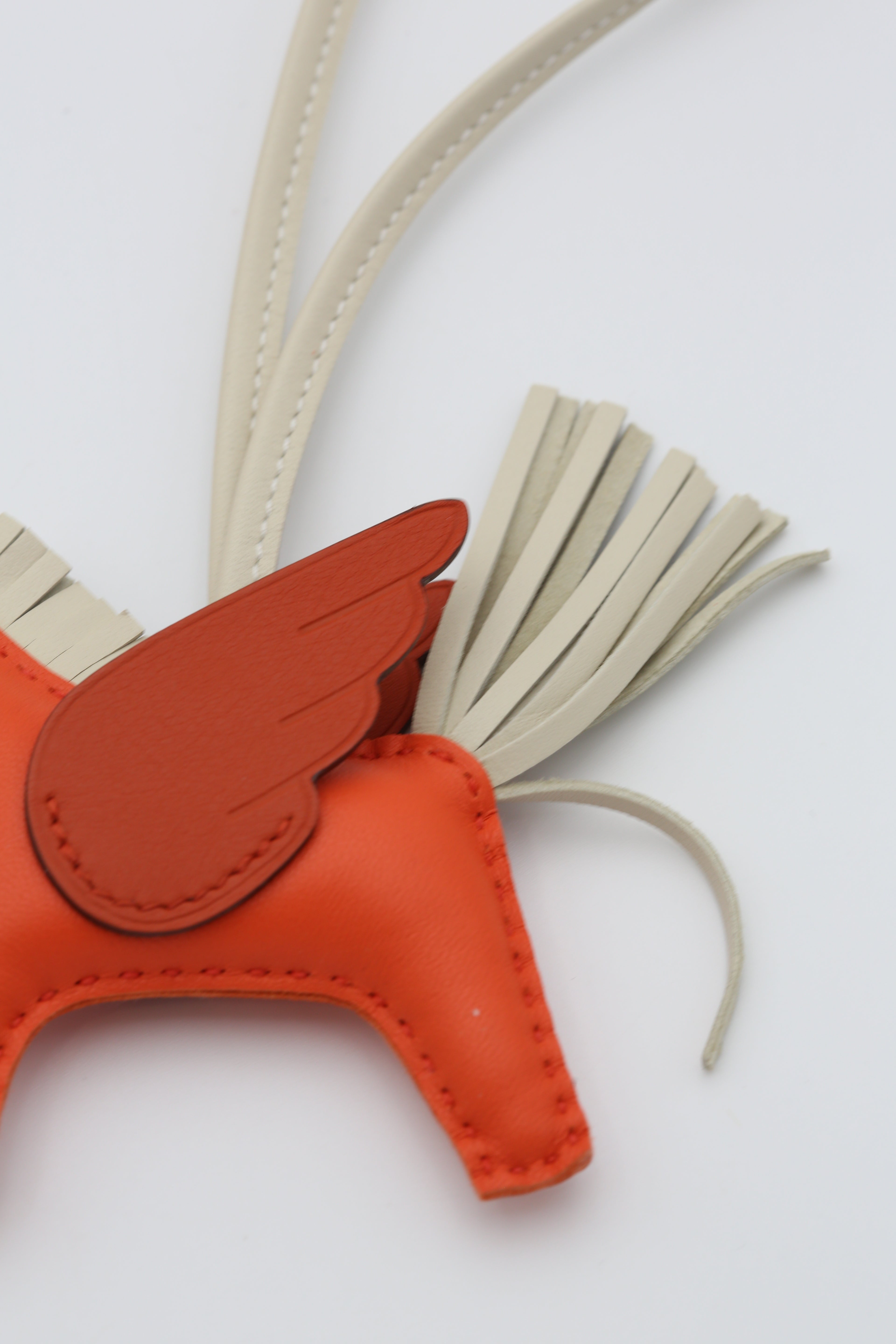 HERMÈS RODEO PEGASE PM CHARM ORANGE/GOLD/CRAIE