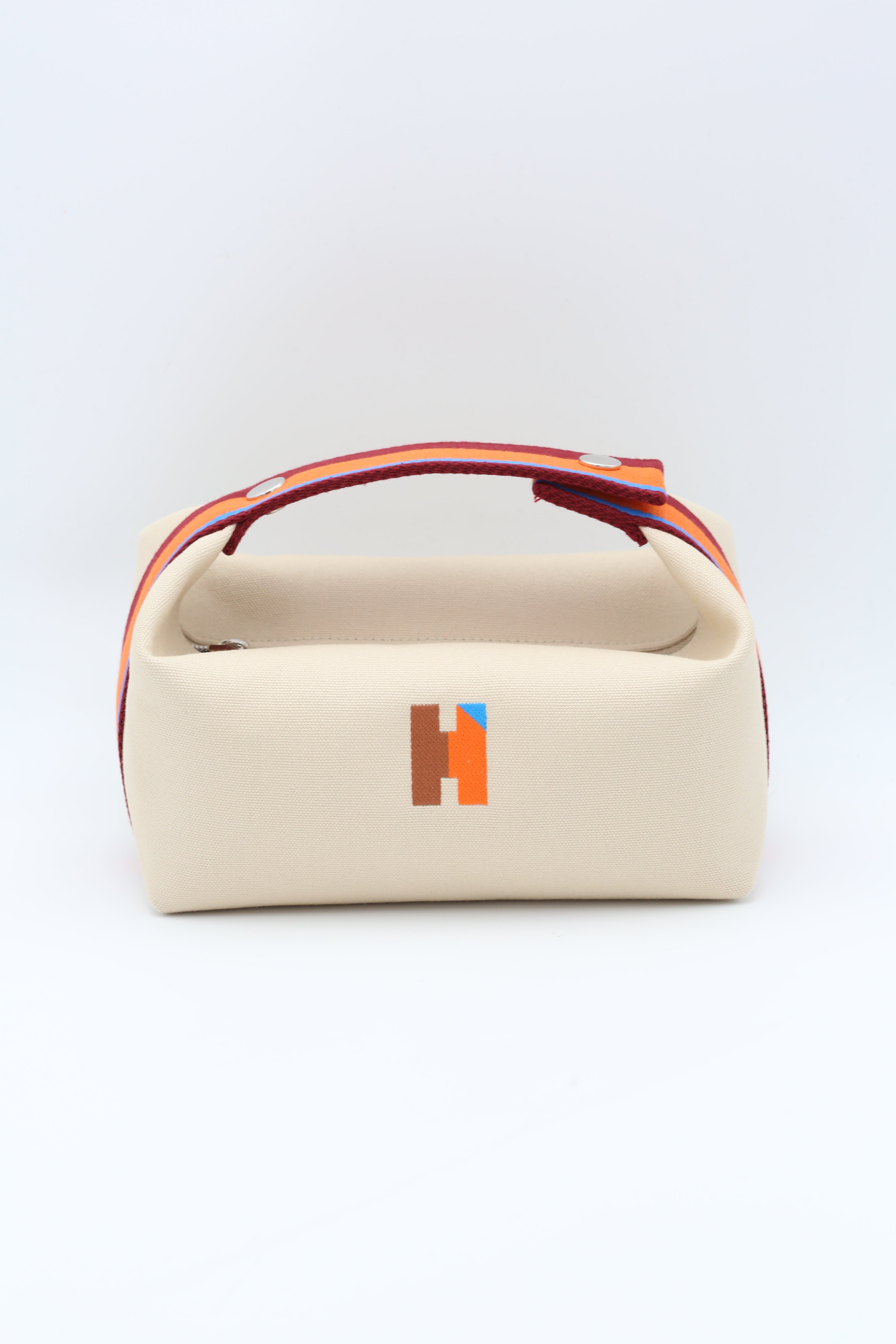 HERMÈS BRIDE-A-BRAC CASE SMALL MODEL NATUREL ORANGE