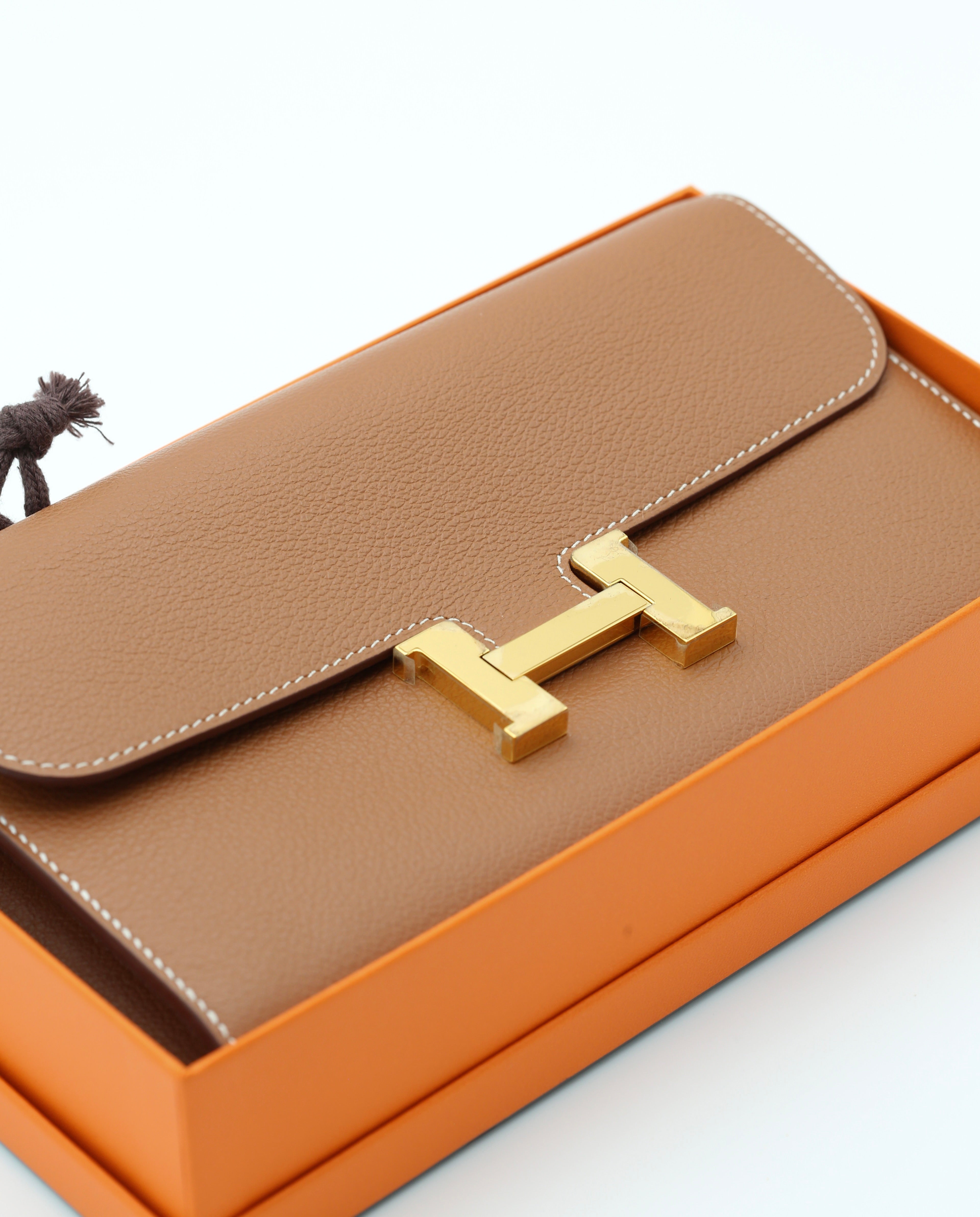 HERMÈS CONSTANCE TO GO WALLET GOLD EVERCOLOR CALFSKIN GOLD HARDWARE