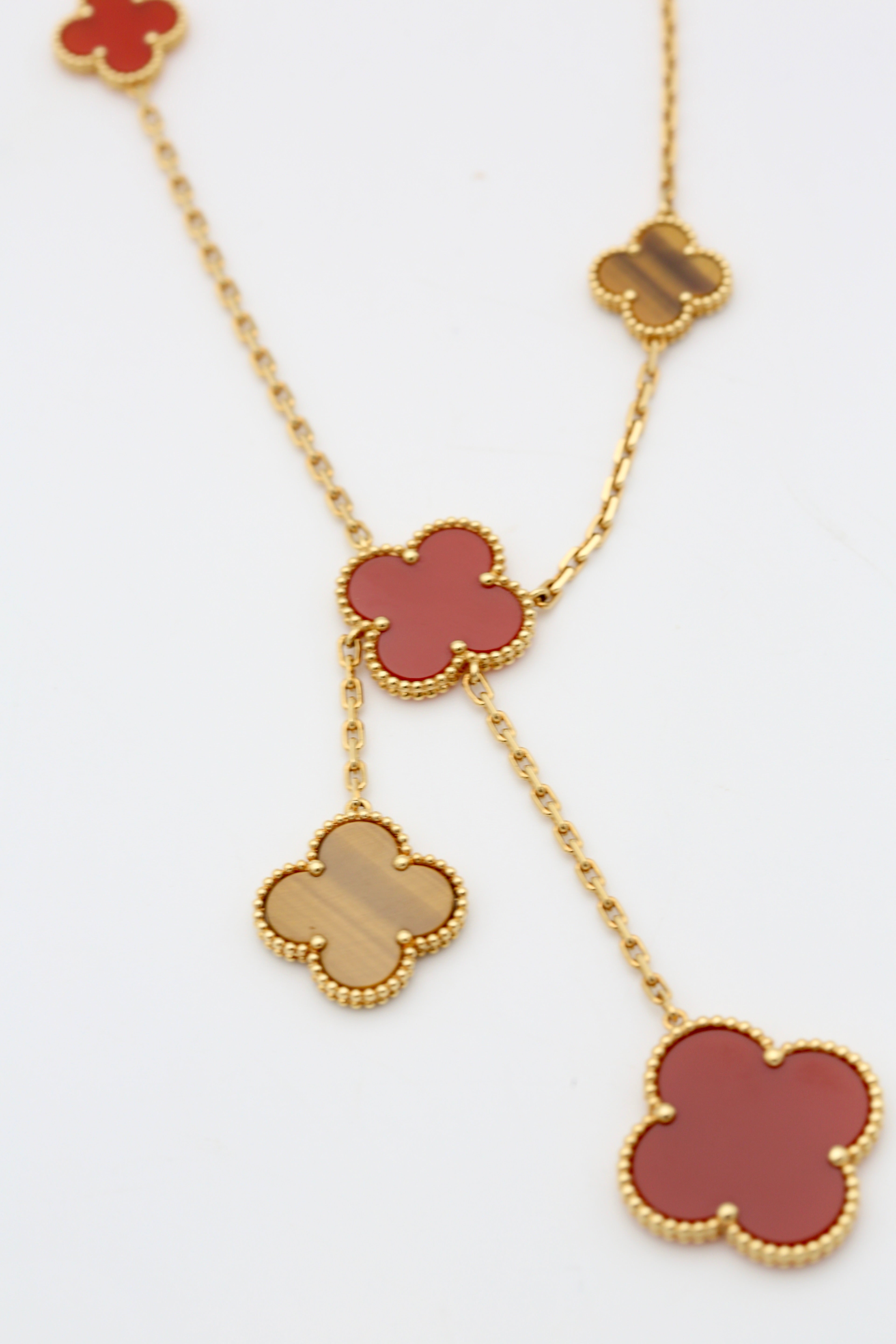 VAN CLEEF & ARPELS MAGIC ALHAMBRA NECKLACE 6 MOTIFS 18K YELLOW GOLD CARNELIAN & TIGER'S EYE