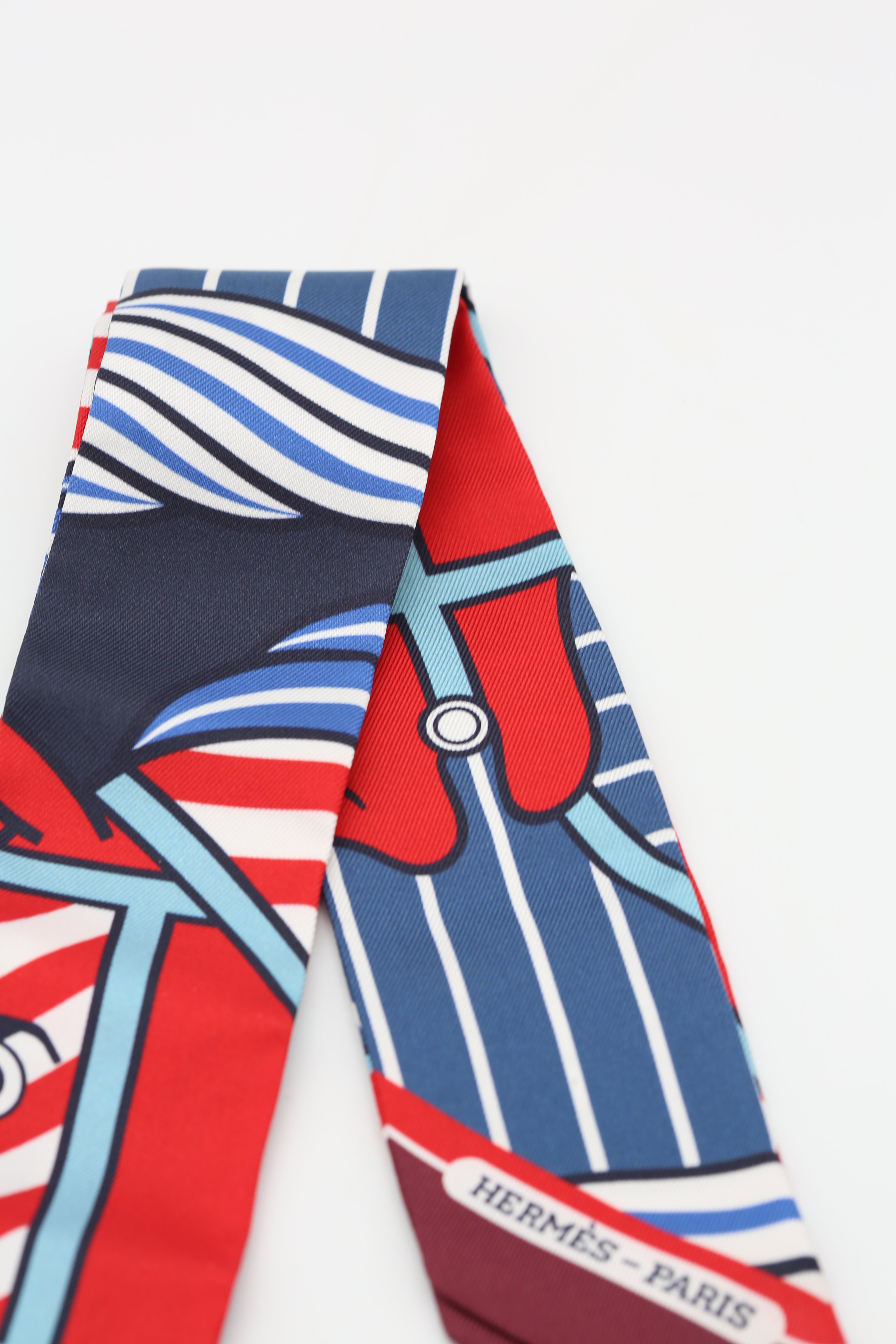 HERMÈS TWILLY QUADRIGE BAYADERE CL/ROUGE/BLEU/BLANC