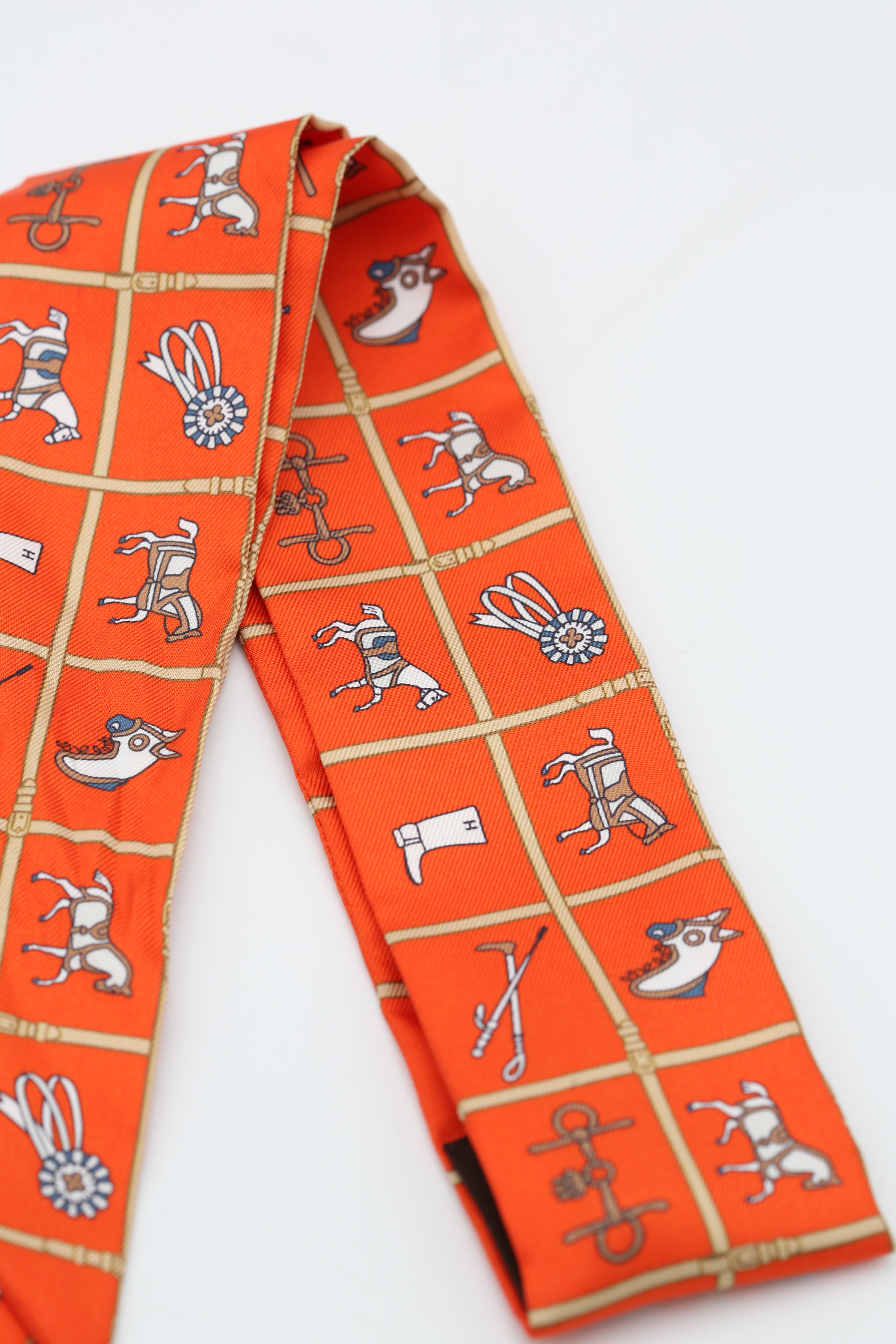 HERMÈS TWILLY ORANGE/MULTICOLOR