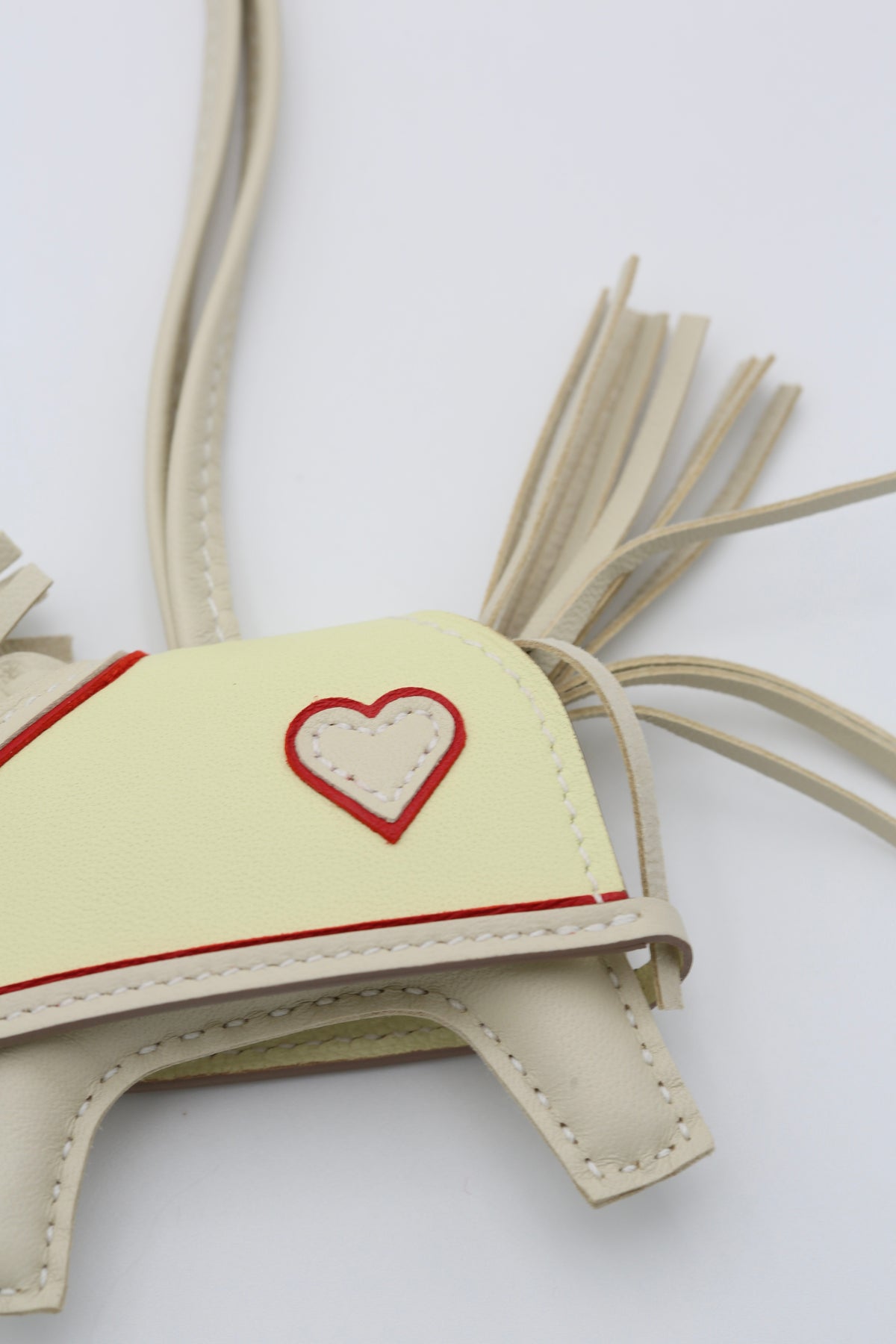 HERMÈS RODEO BAG CHARM CRAIE WITH HEARTS PATTERN