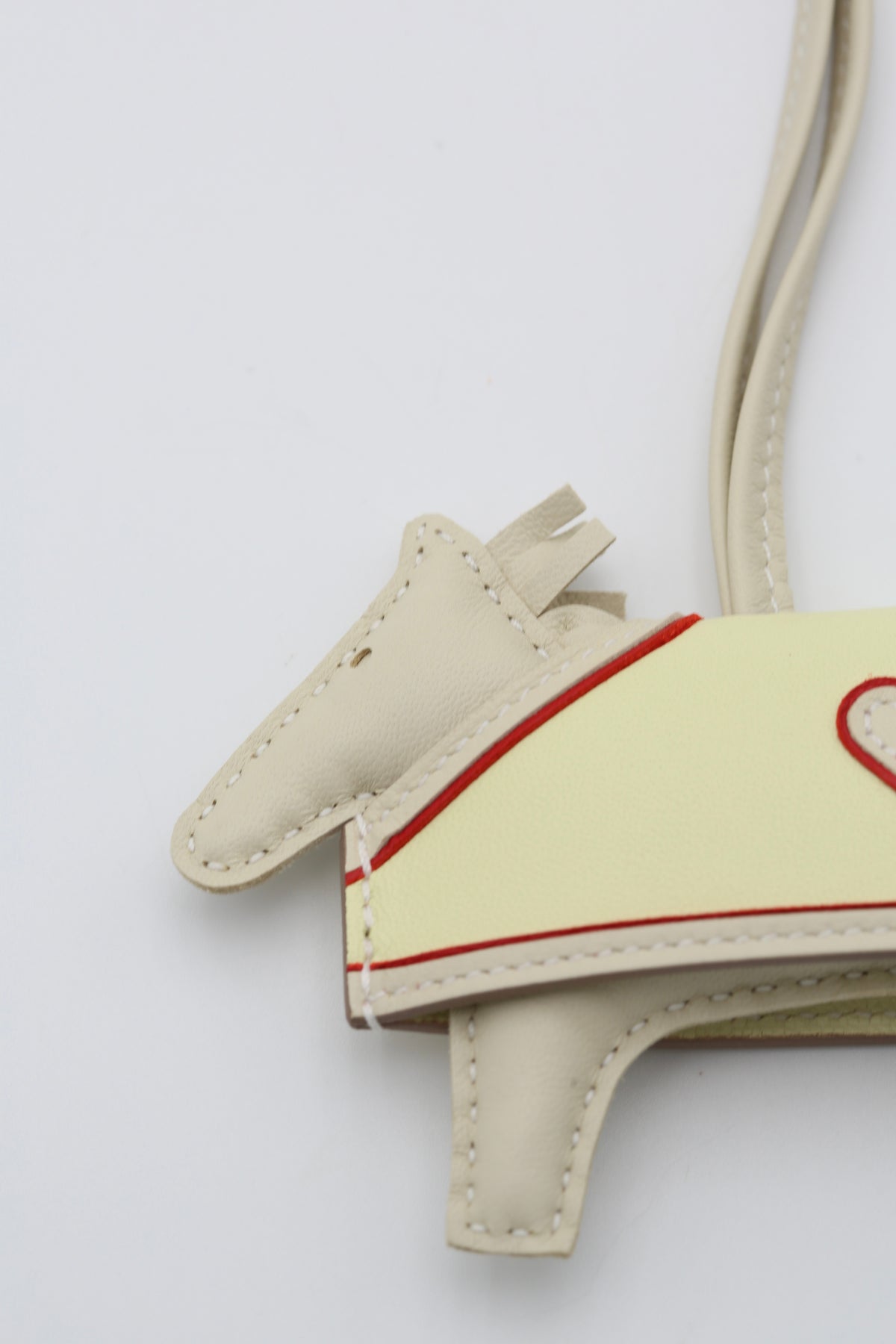 HERMÈS RODEO BAG CHARM CRAIE WITH HEARTS PATTERN