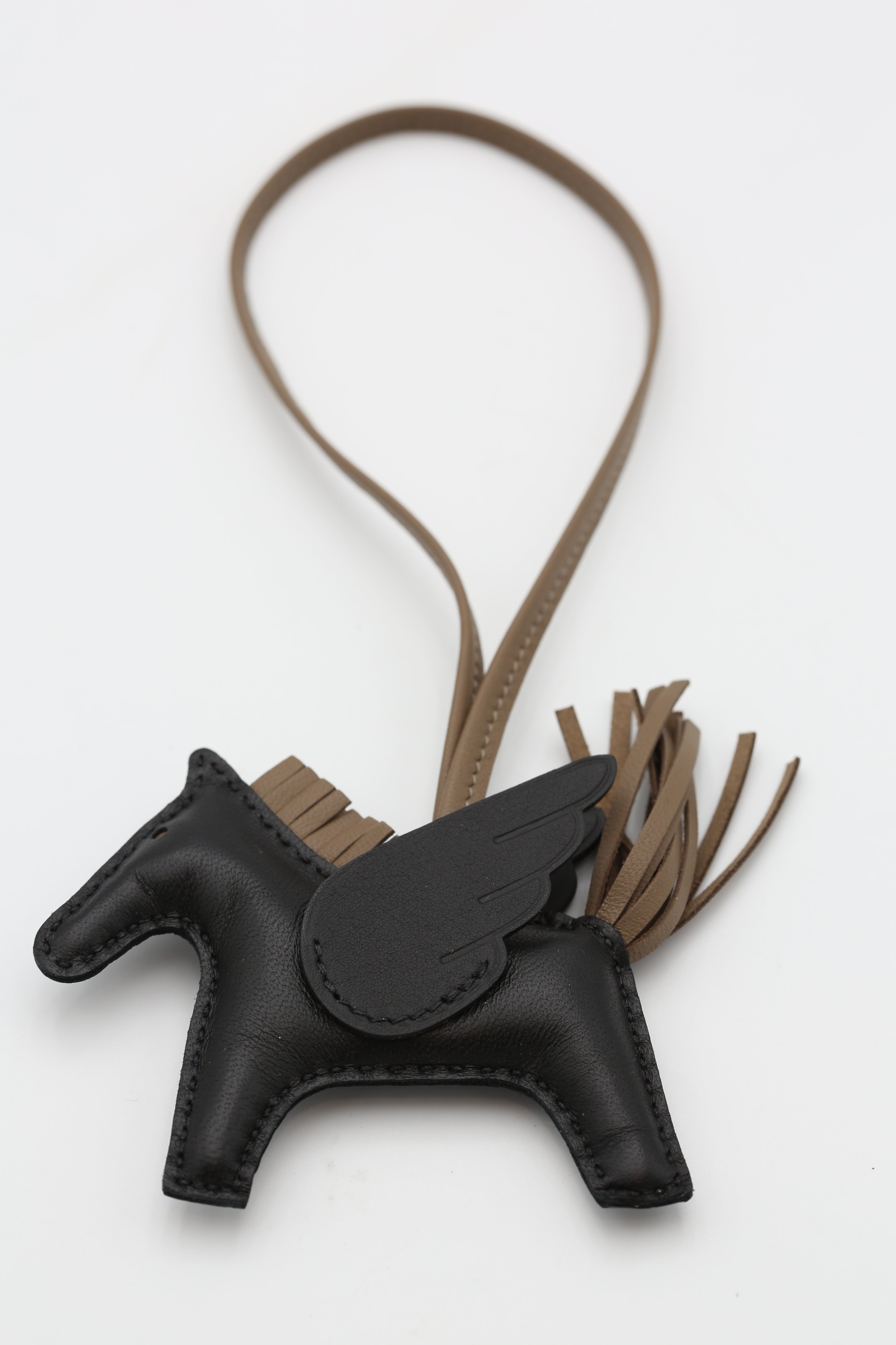 HERMÈS RODEO PEGASE PM CHARM NOIR/ETOUPE
