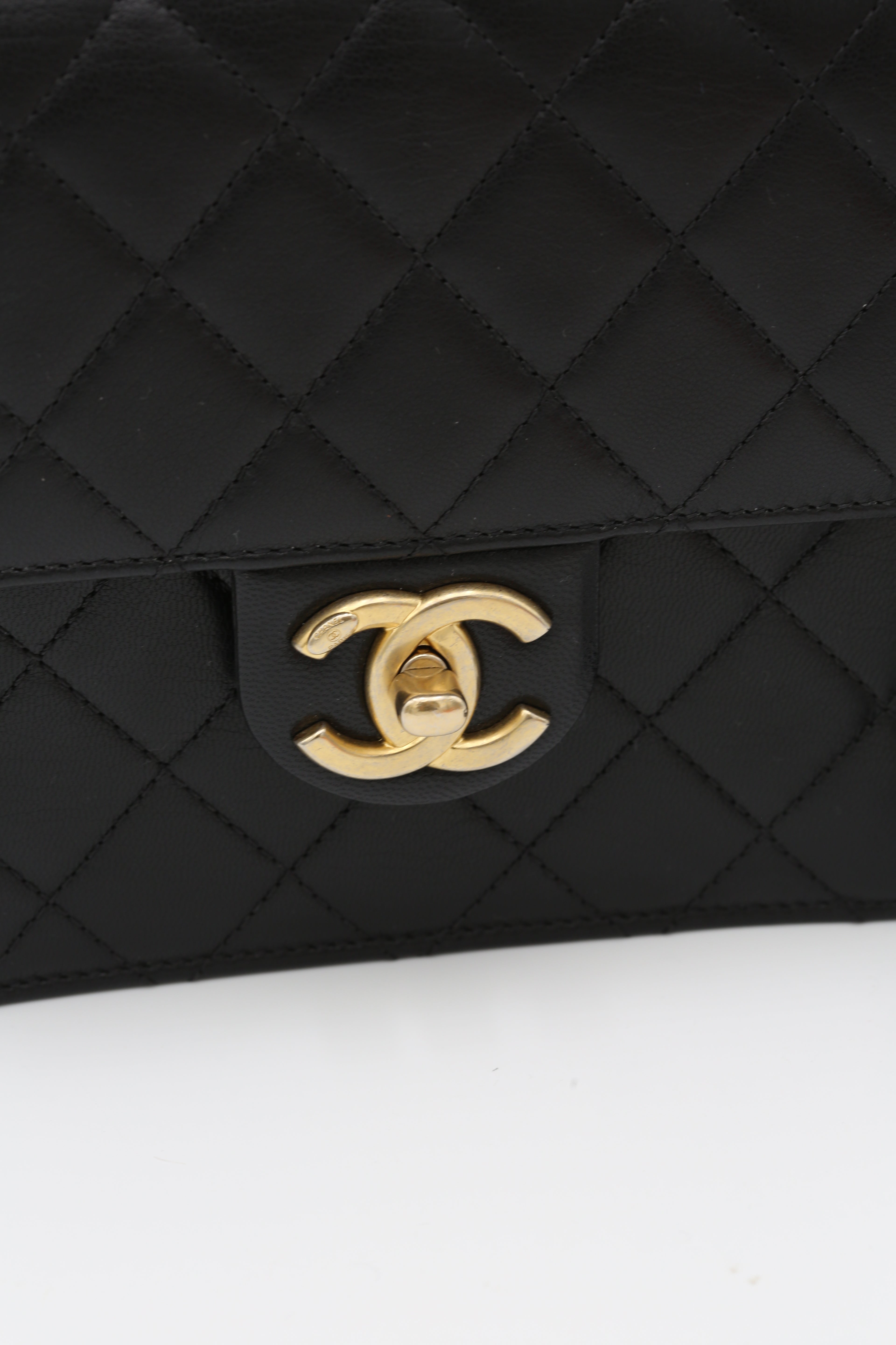 CHANEL BLACK QUILTED MINI BAG WITH PEARL HANDLE