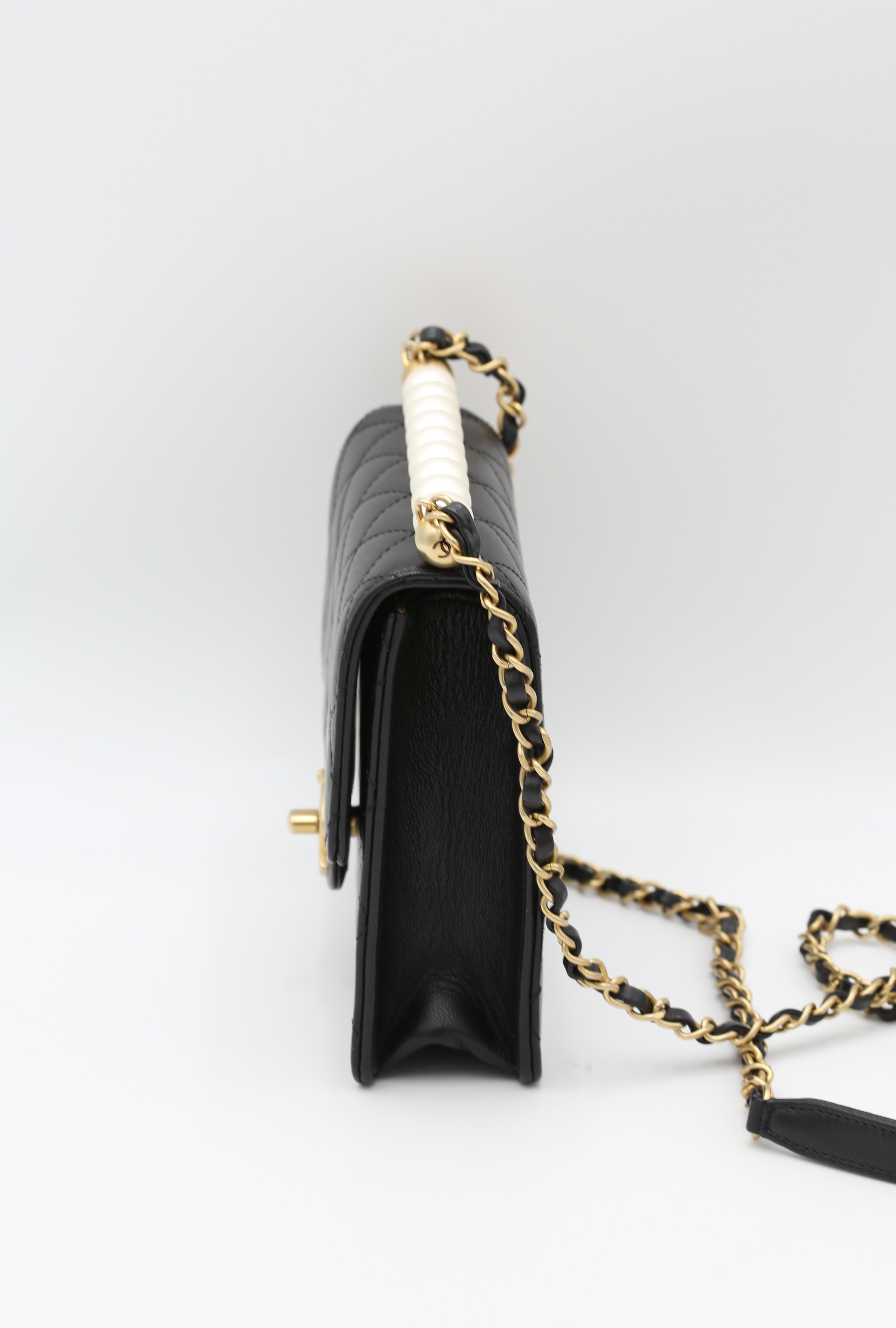 CHANEL BLACK QUILTED MINI BAG WITH PEARL HANDLE