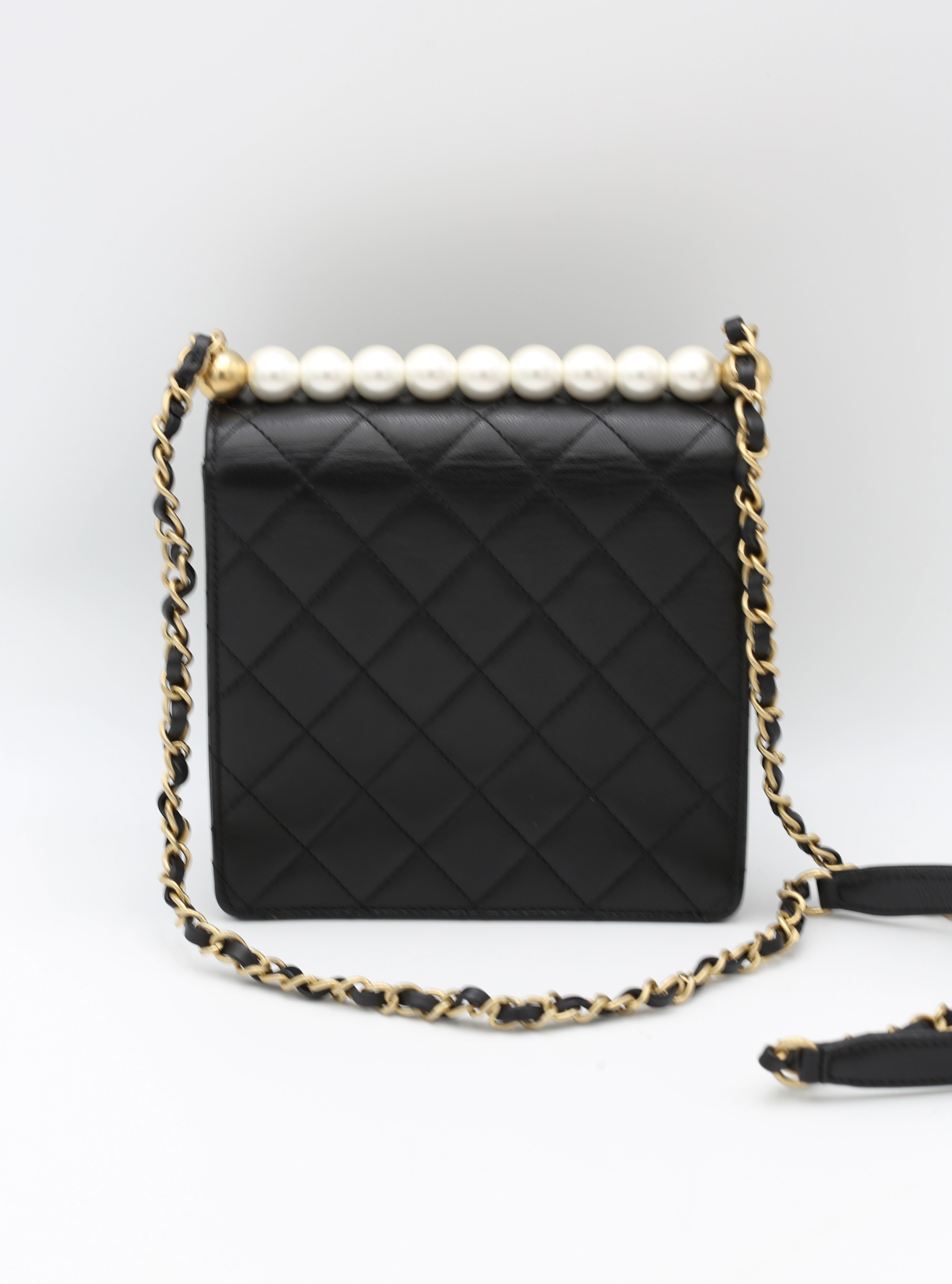 CHANEL BLACK QUILTED MINI BAG WITH PEARL HANDLE