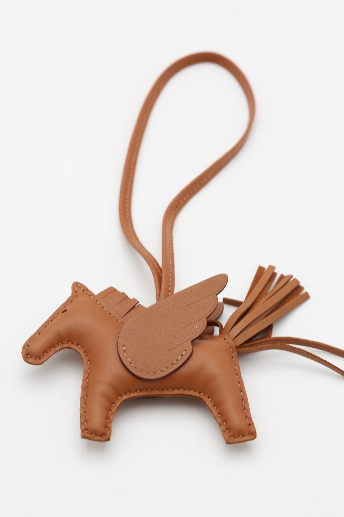 HERMÈS RODEO PEGASE PM CHARM GOLD