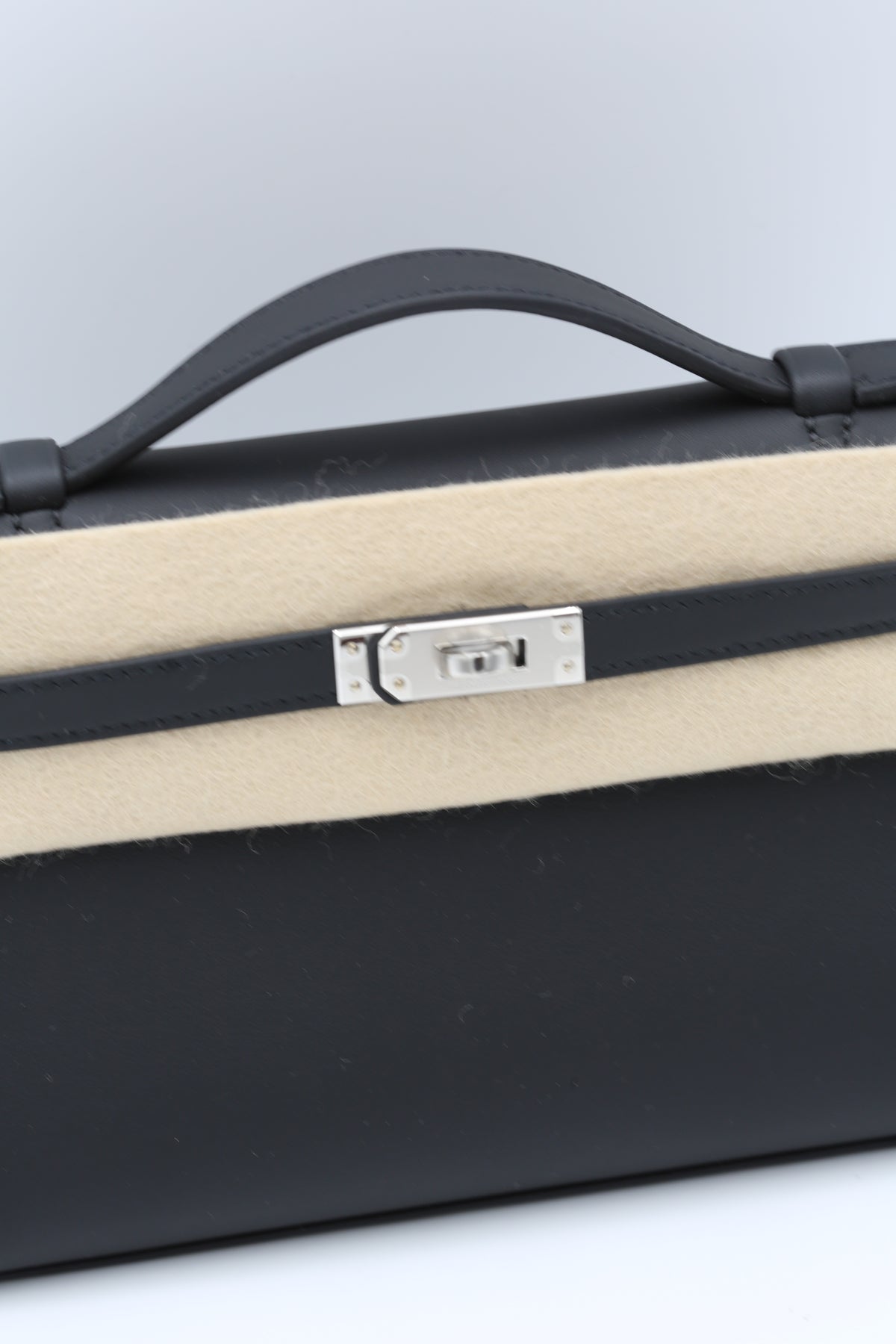 HERMÈS KELLY POCHETTE NOIR SWIFT SILVER HARDWARE G STAMP