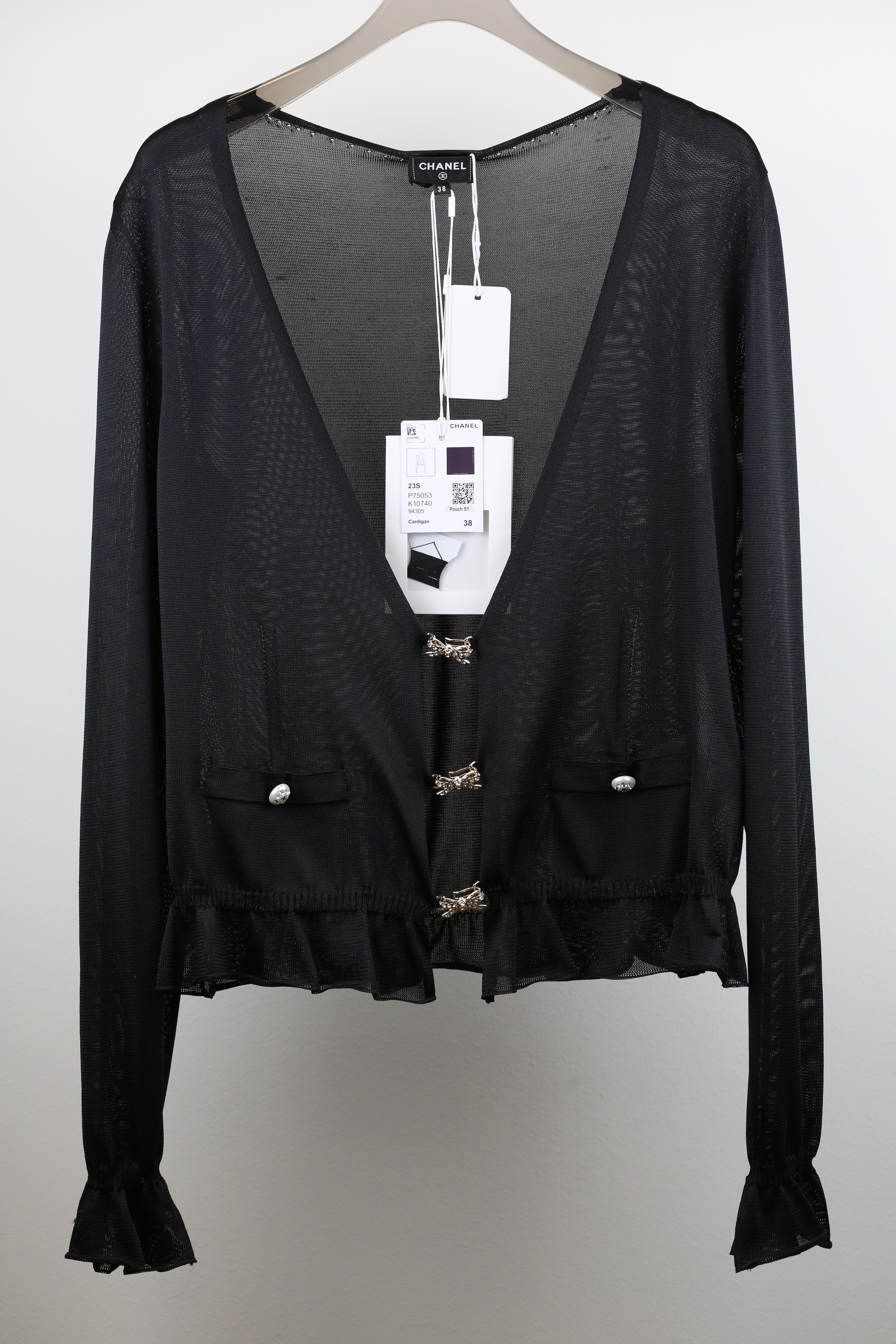 Cardigan with butterfly clasp