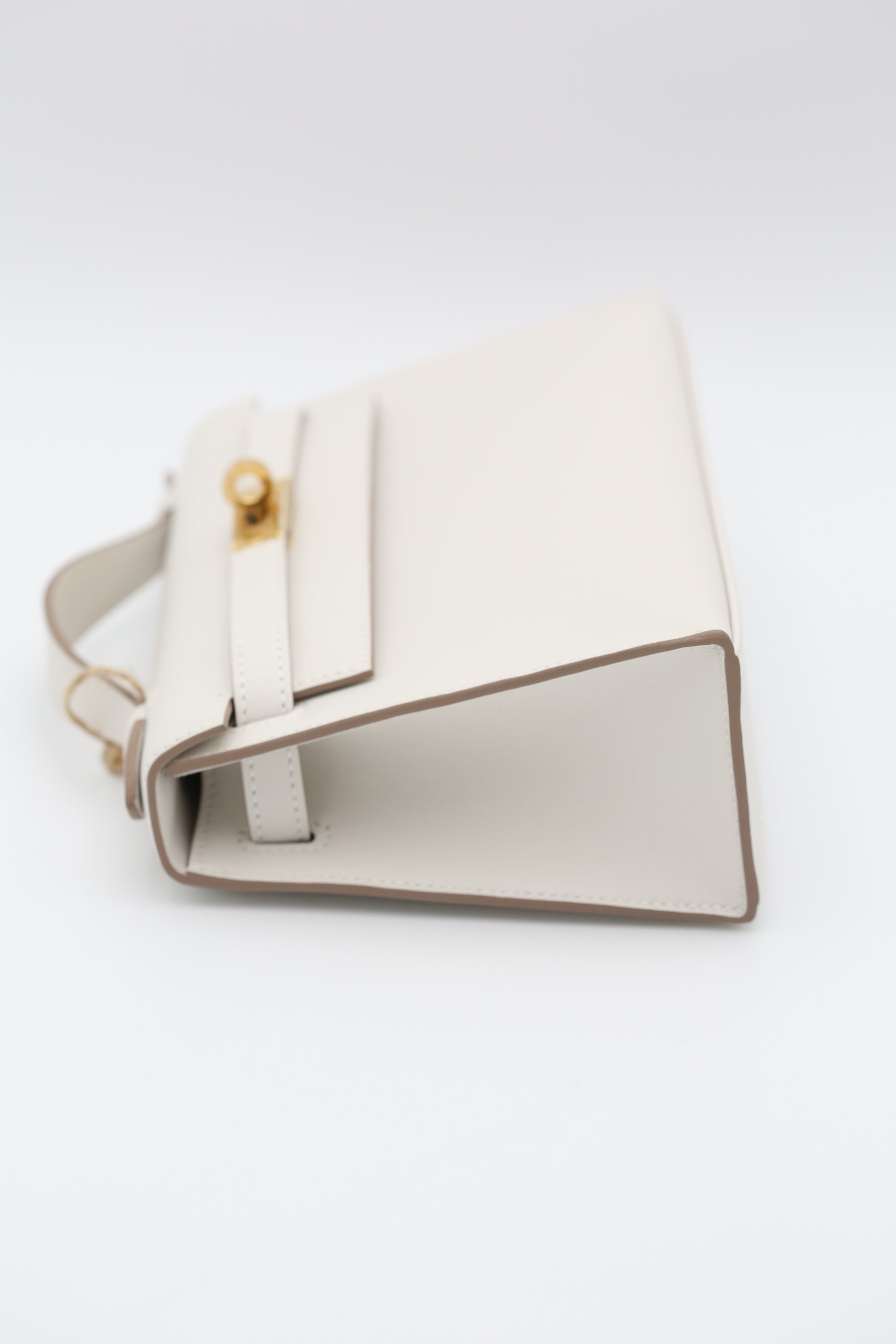 HERMÈS KELLY POCHETTE M4 GOLD