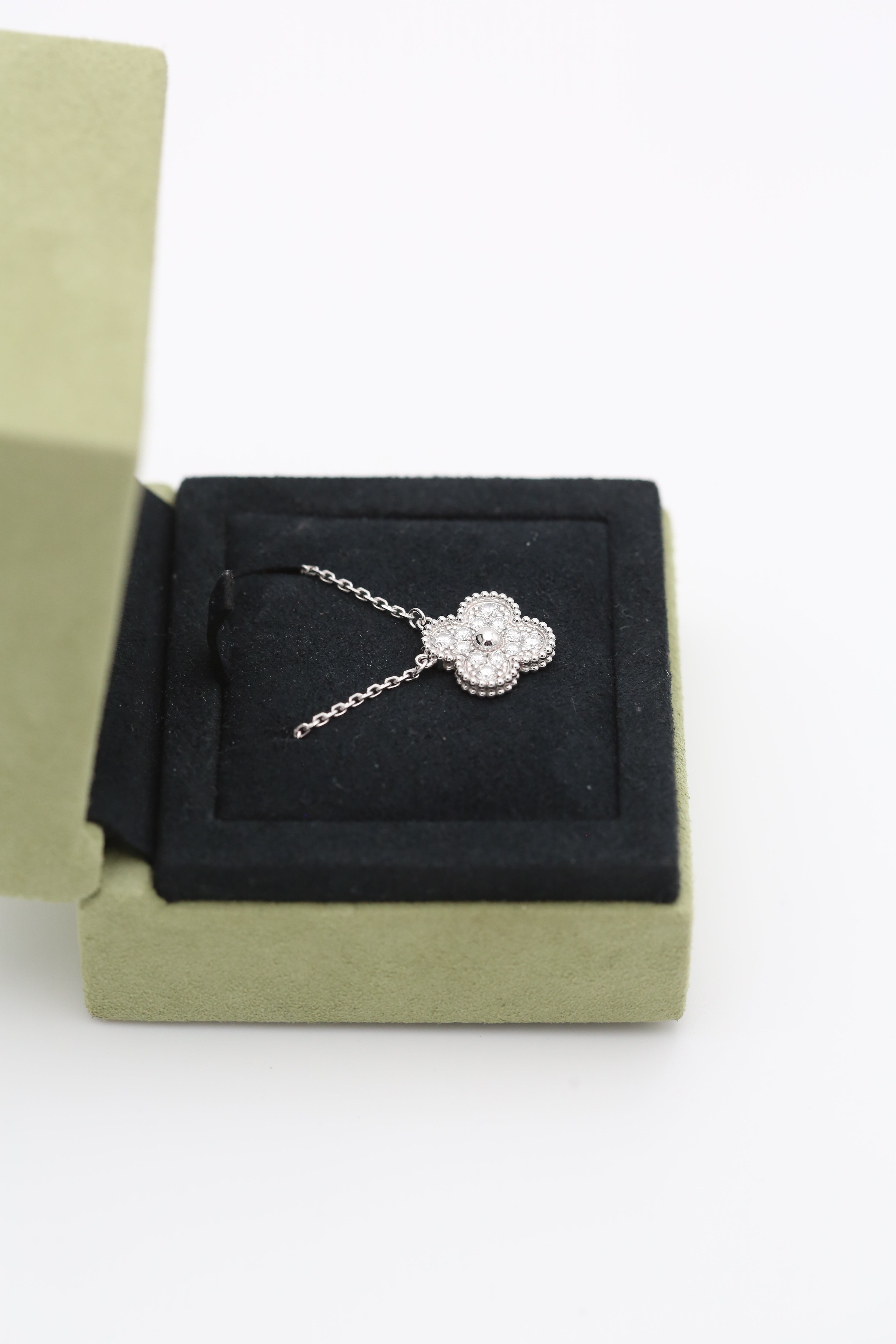 VAN CLEEF & ARPELS ALHAMBRA WHITE GOLD PENDANT