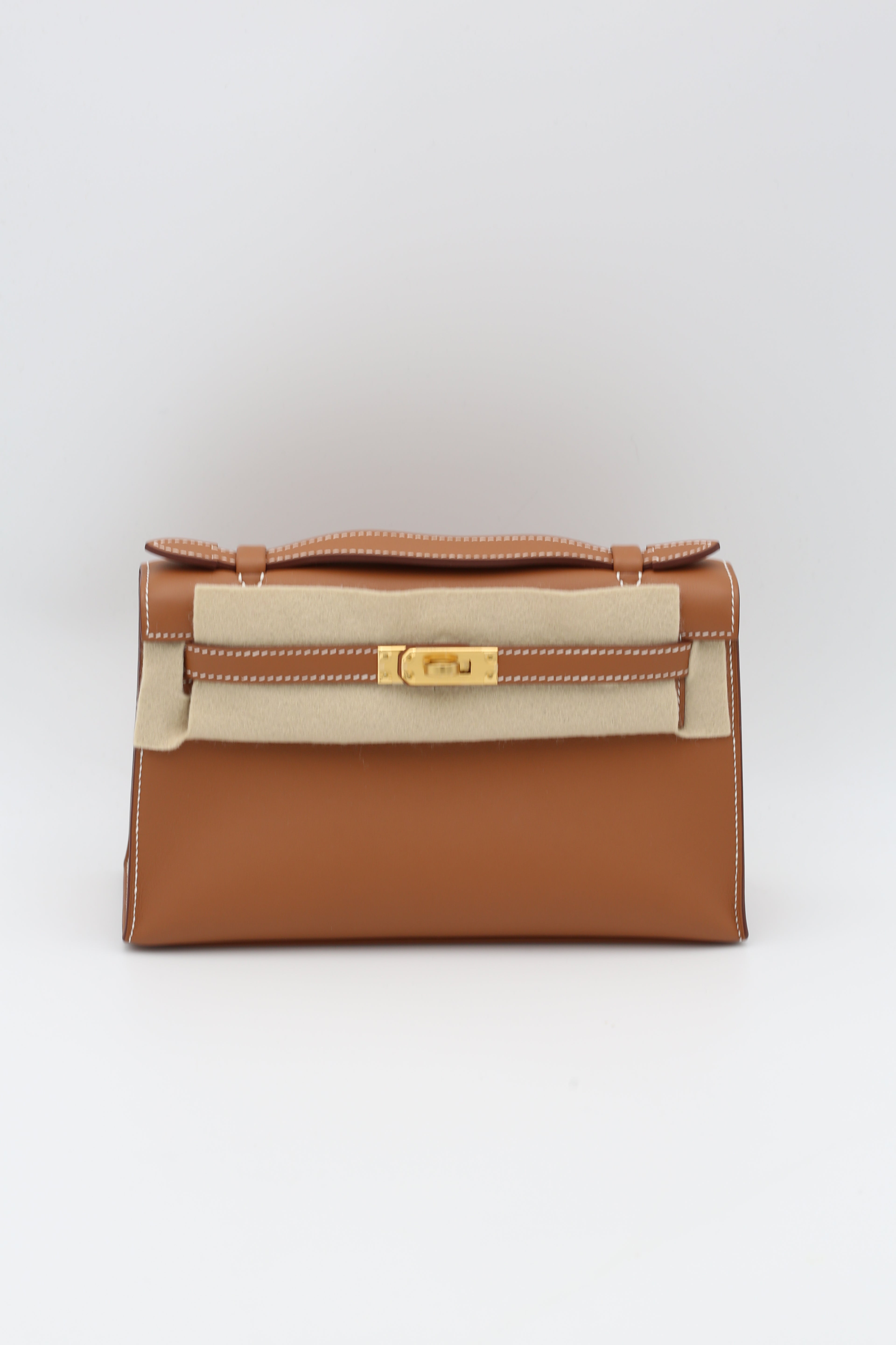 HERMÈS KELLY POCHETTE GOLD SWIFT GOLD HARDWARE W STAMP