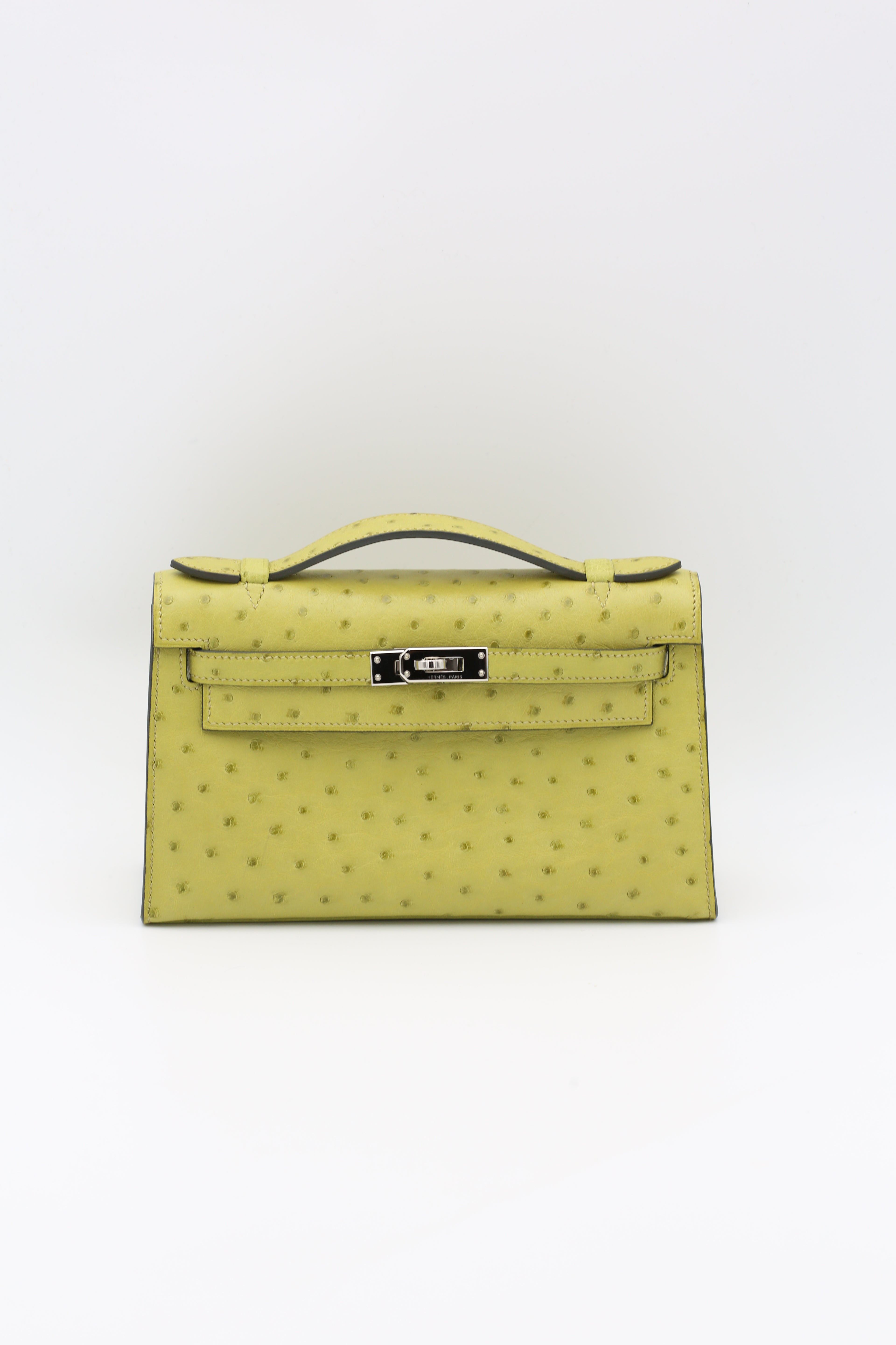 HERMÈS KELLY POCHETTE OSTRICH VERT POMME SILVER HARDWARE X STAMP