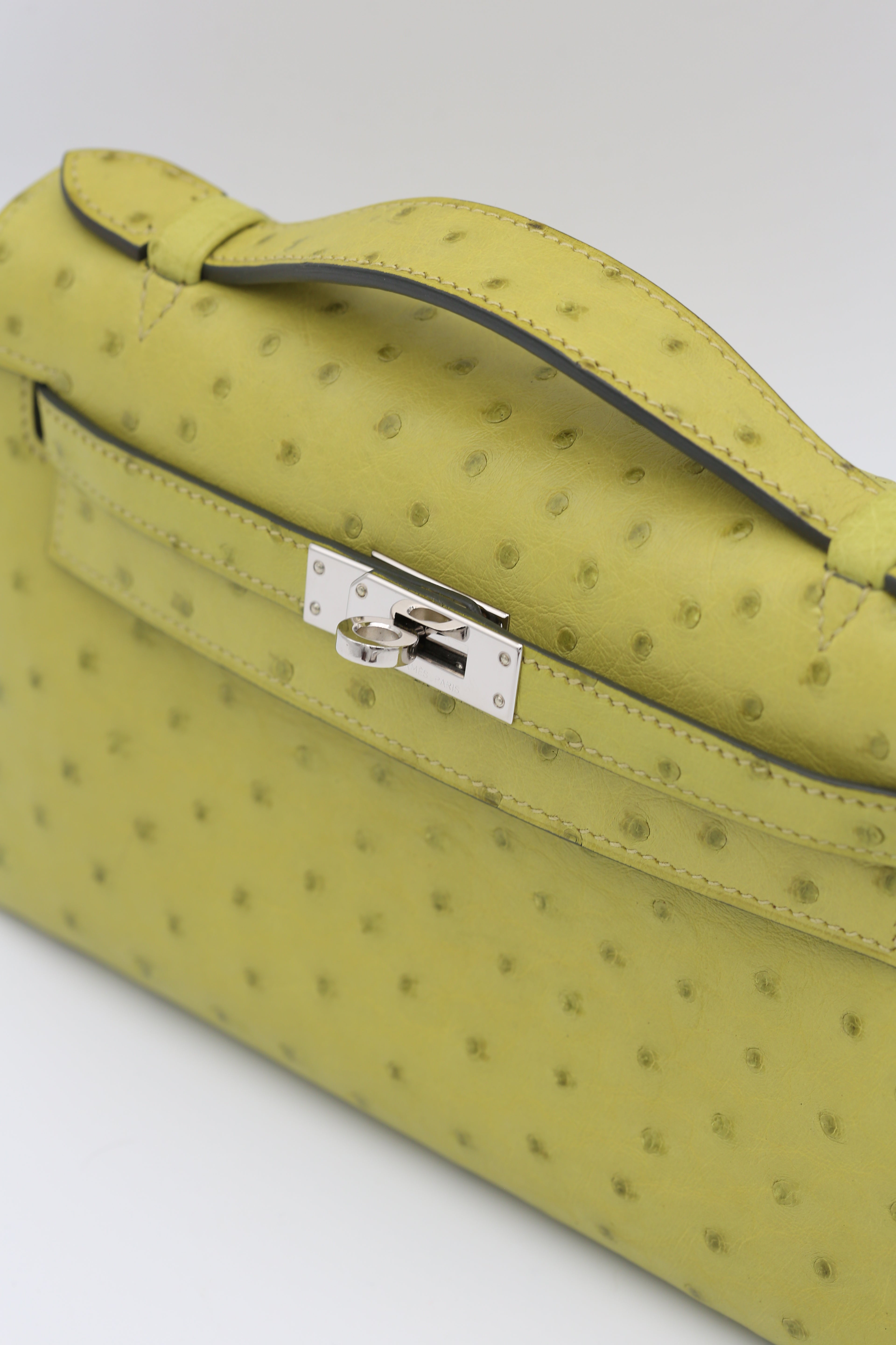 HERMÈS KELLY POCHETTE OSTRICH VERT POMME SILVER HARDWARE X STAMP