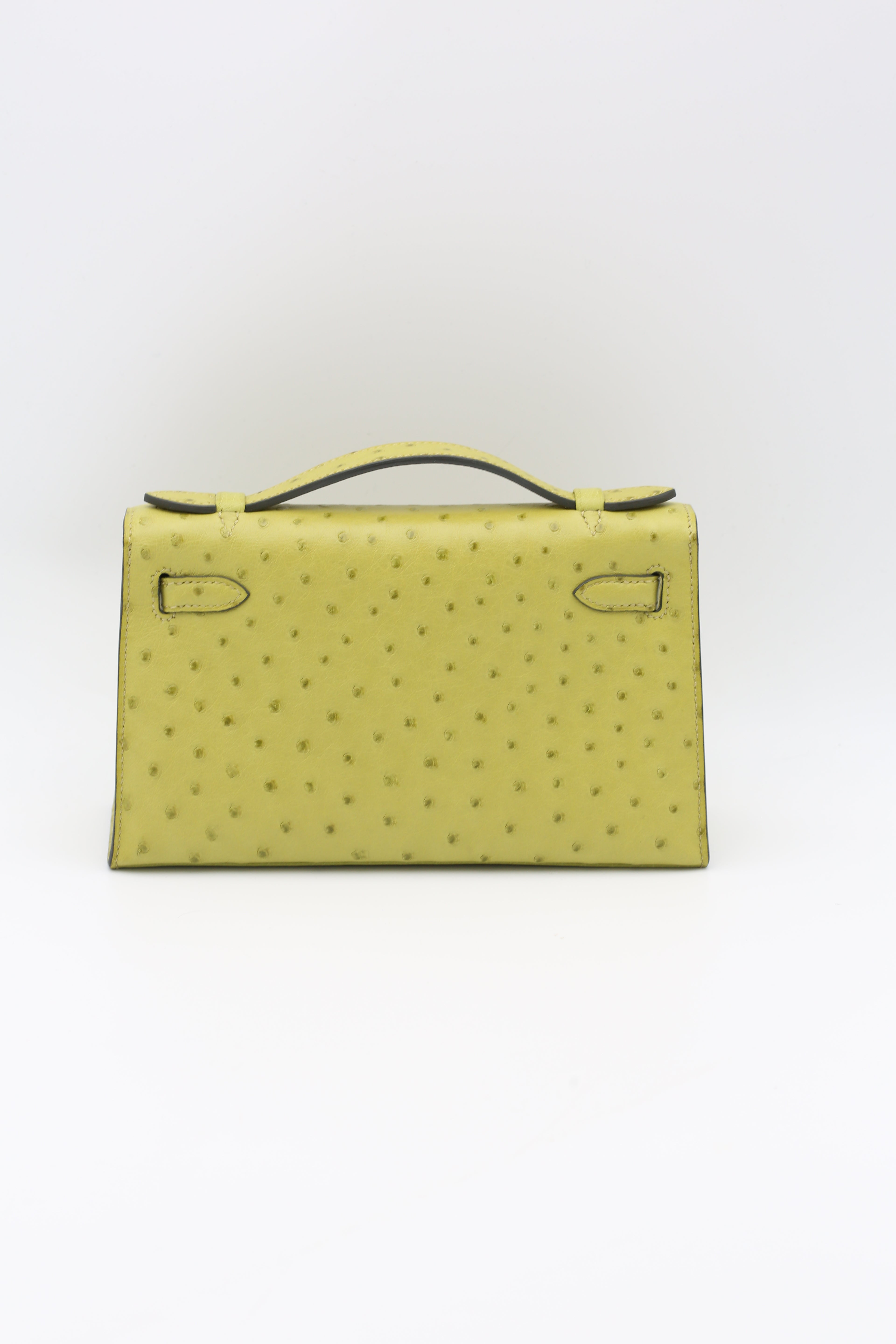 HERMÈS KELLY POCHETTE OSTRICH VERT POMME SILVER HARDWARE X STAMP