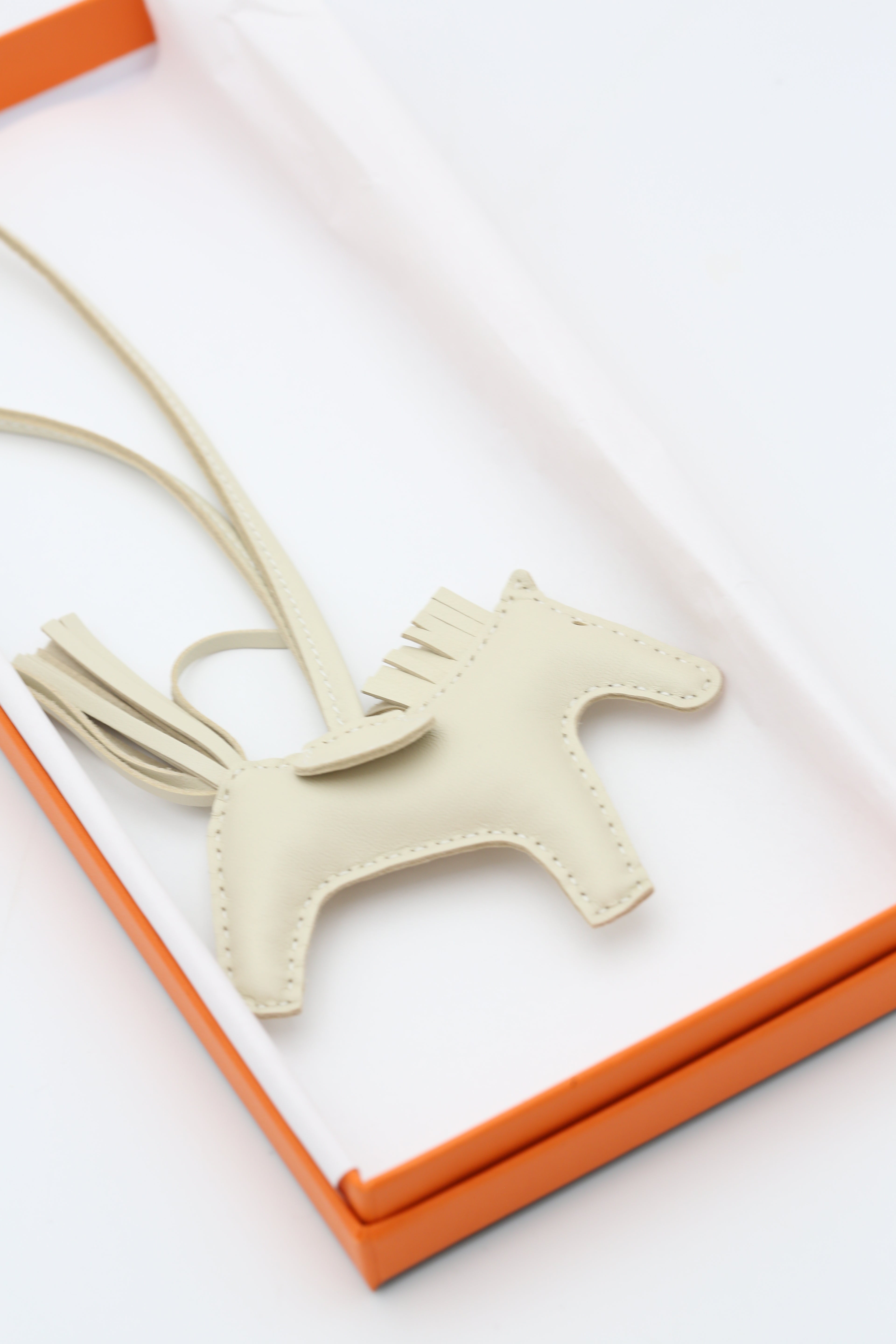 HERMÈS RODEO PM CHARM WHITE