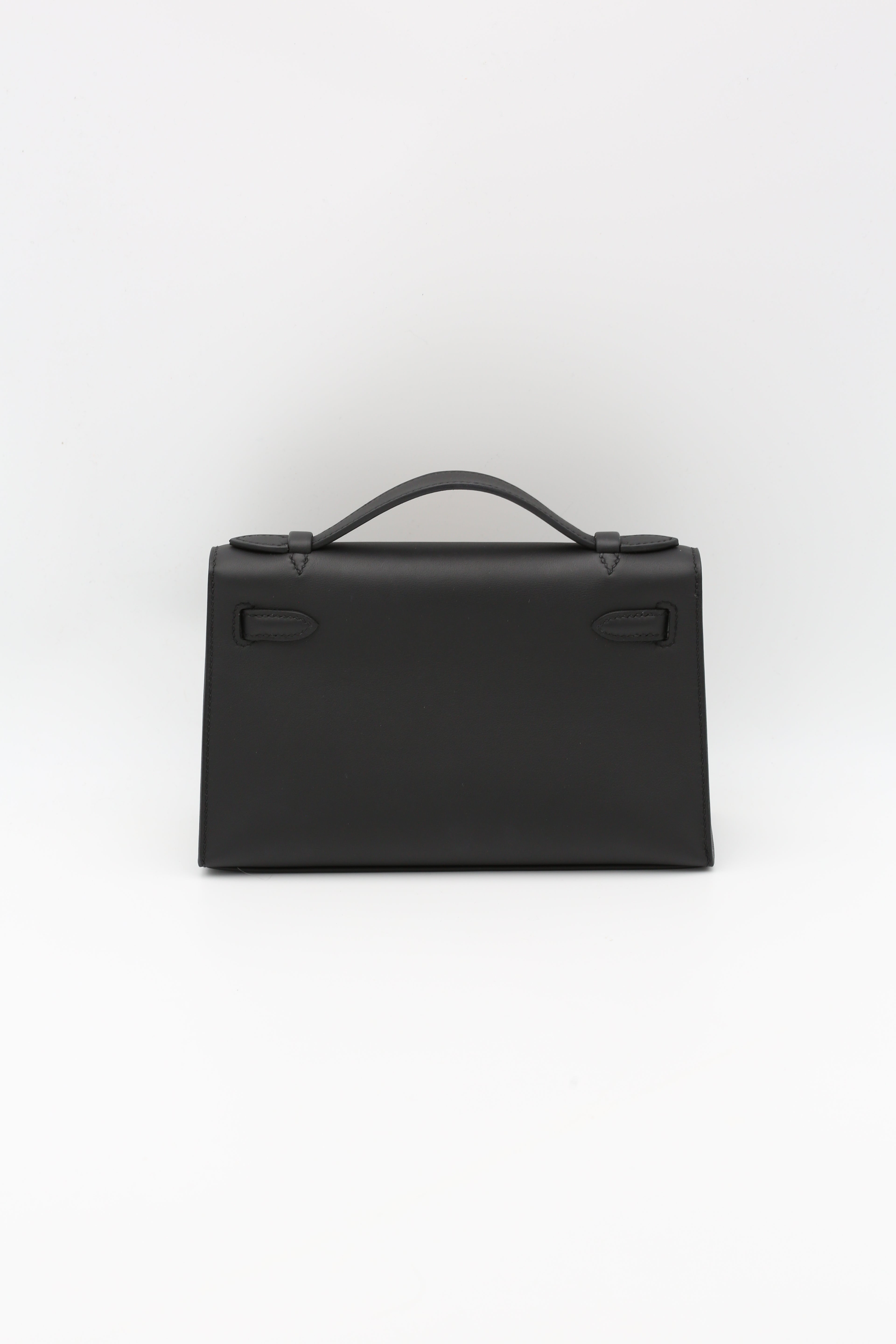 HERMÈS KELLY POCHETTE NOIR SWIFT GOLD HARDWARE K STAMP