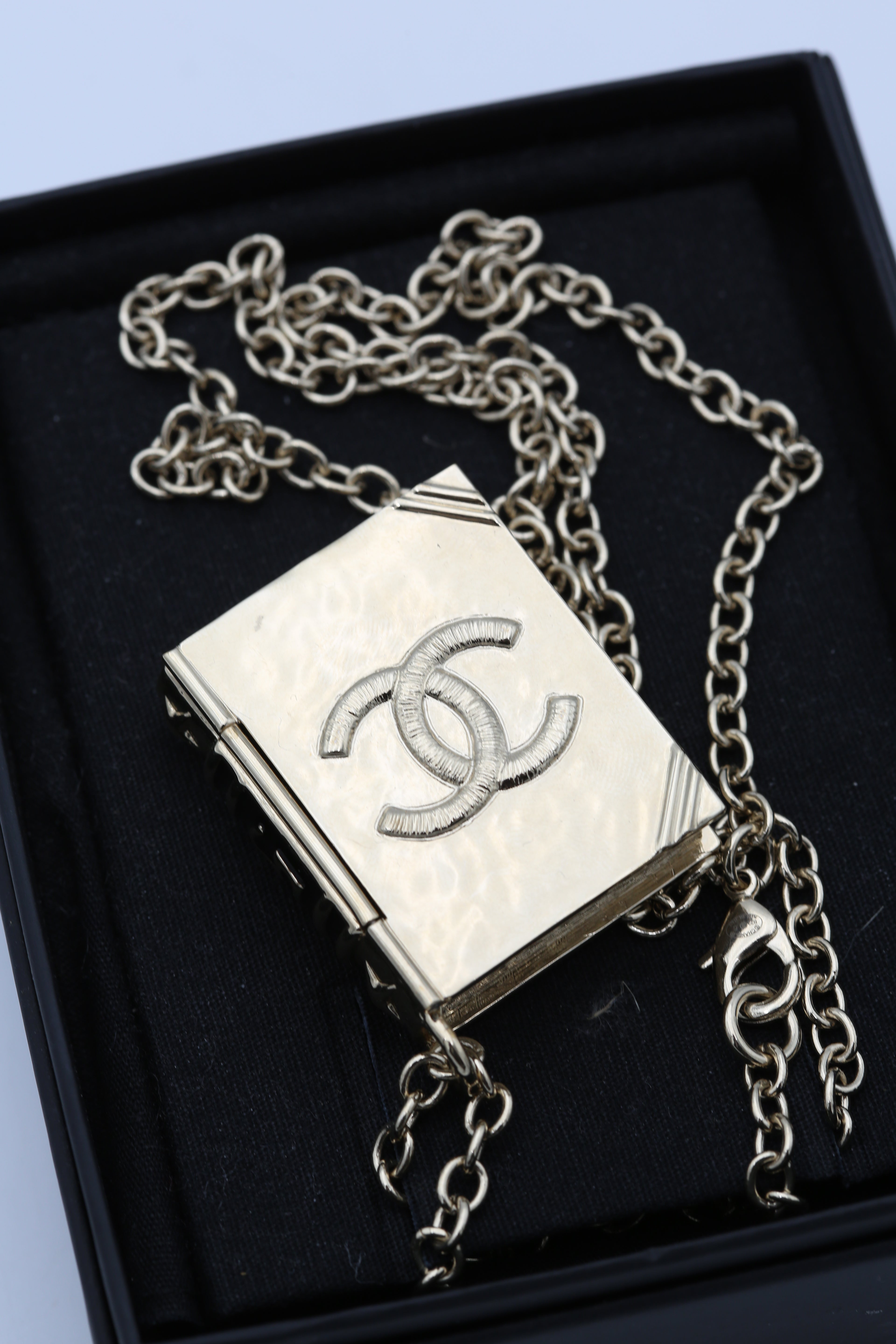 CHANEL BOOK NECKLACE GOLD