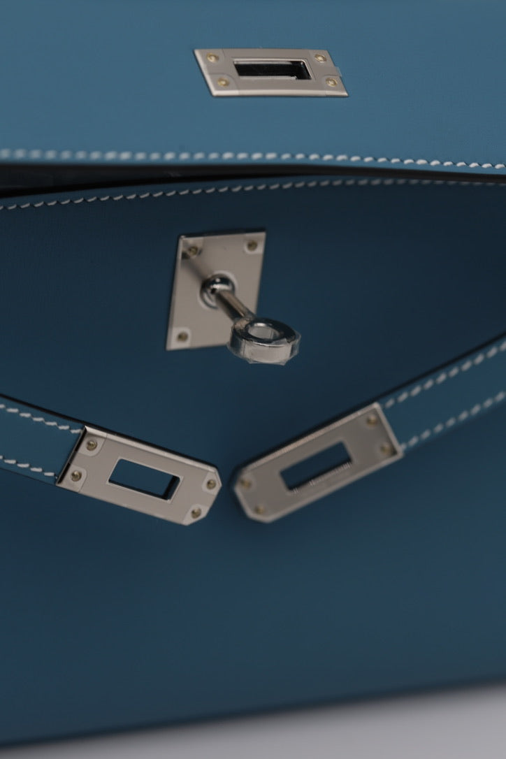 HERMÈS KELLY POCHETTE BLUE SWIFT G STAMP