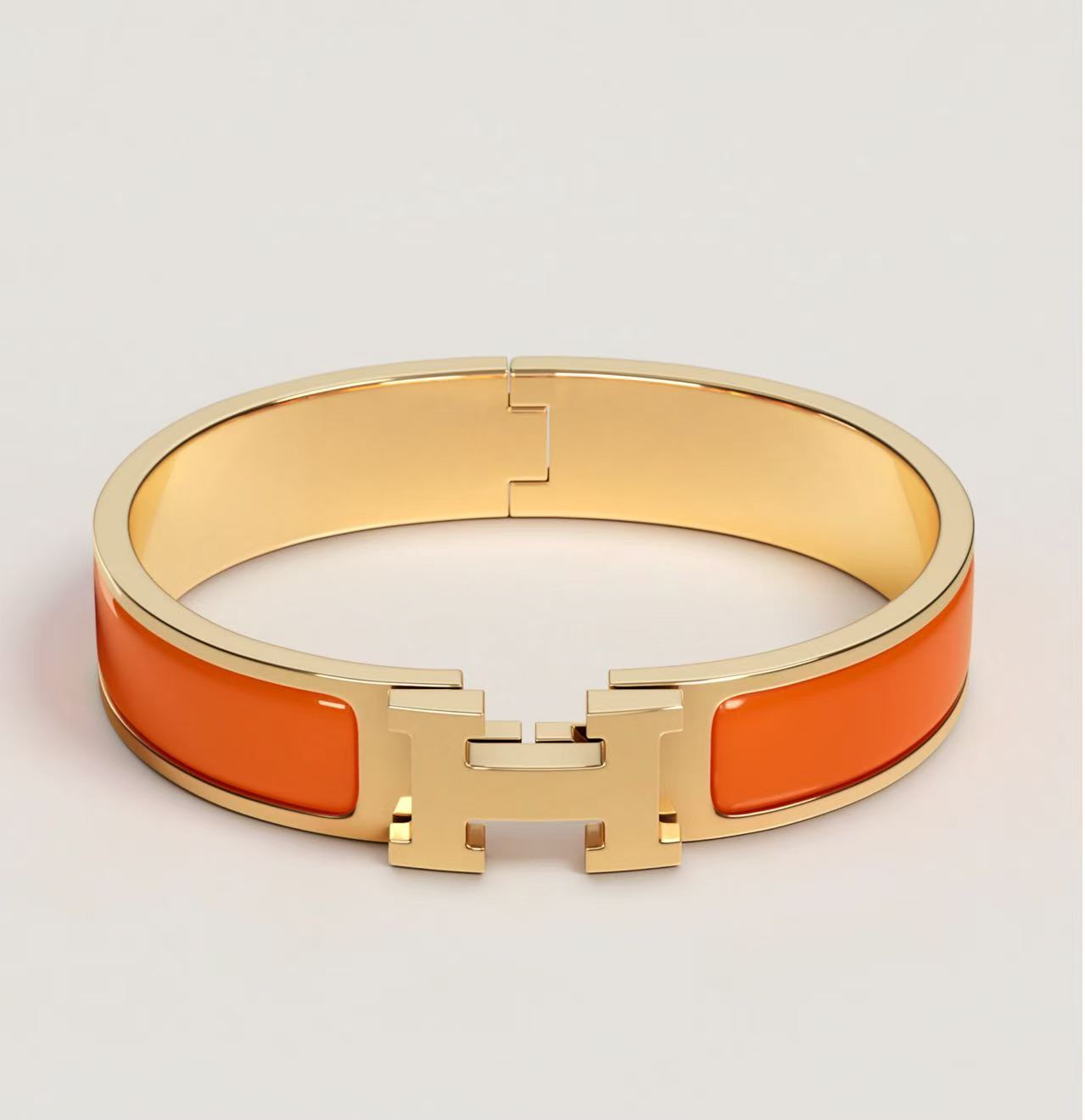 HERMÈS CLIC H BRACELET YELLOW GOLD SMALL ORANGE
