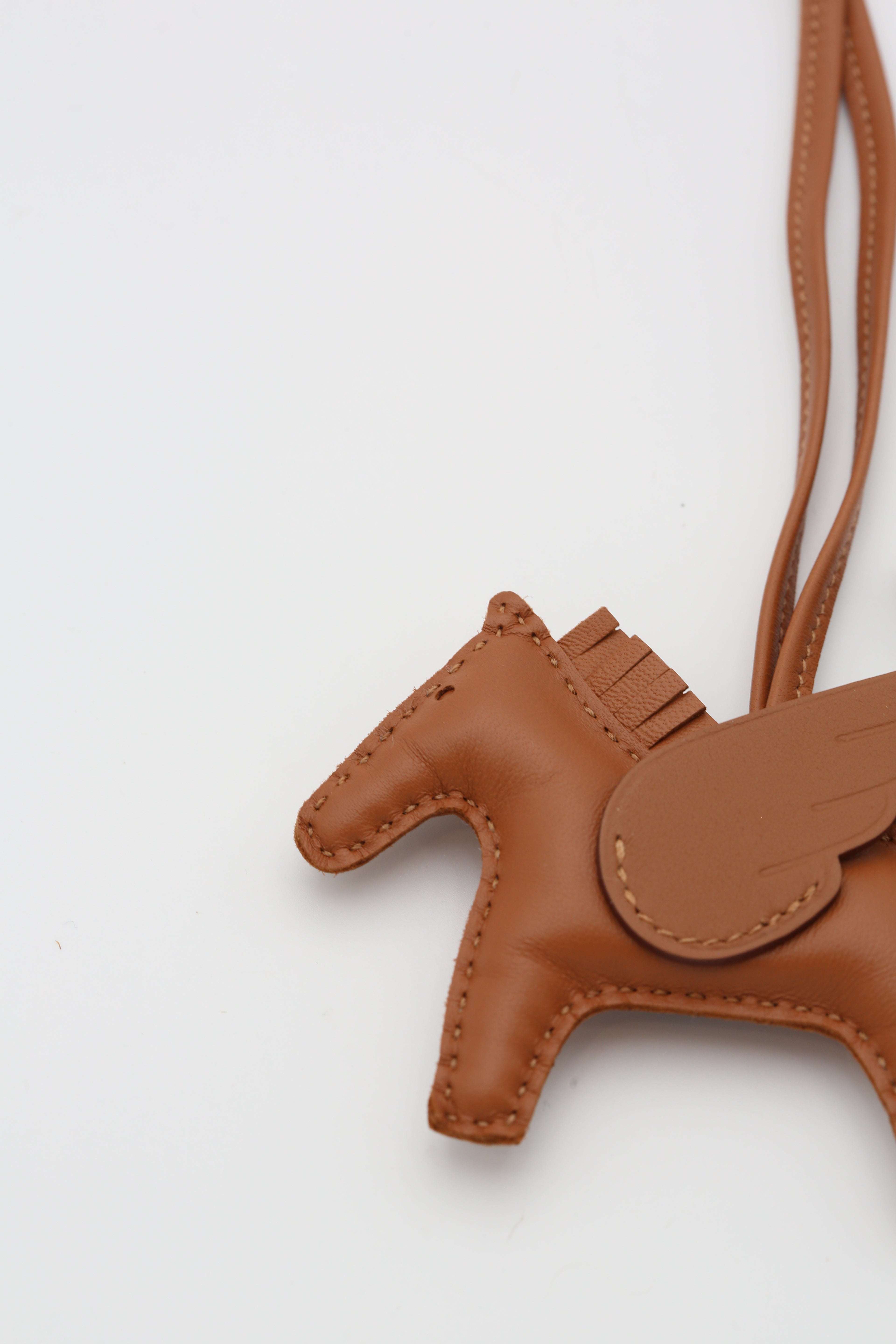 HERMÈS RODEO PEGASE PM CHARM GOLD