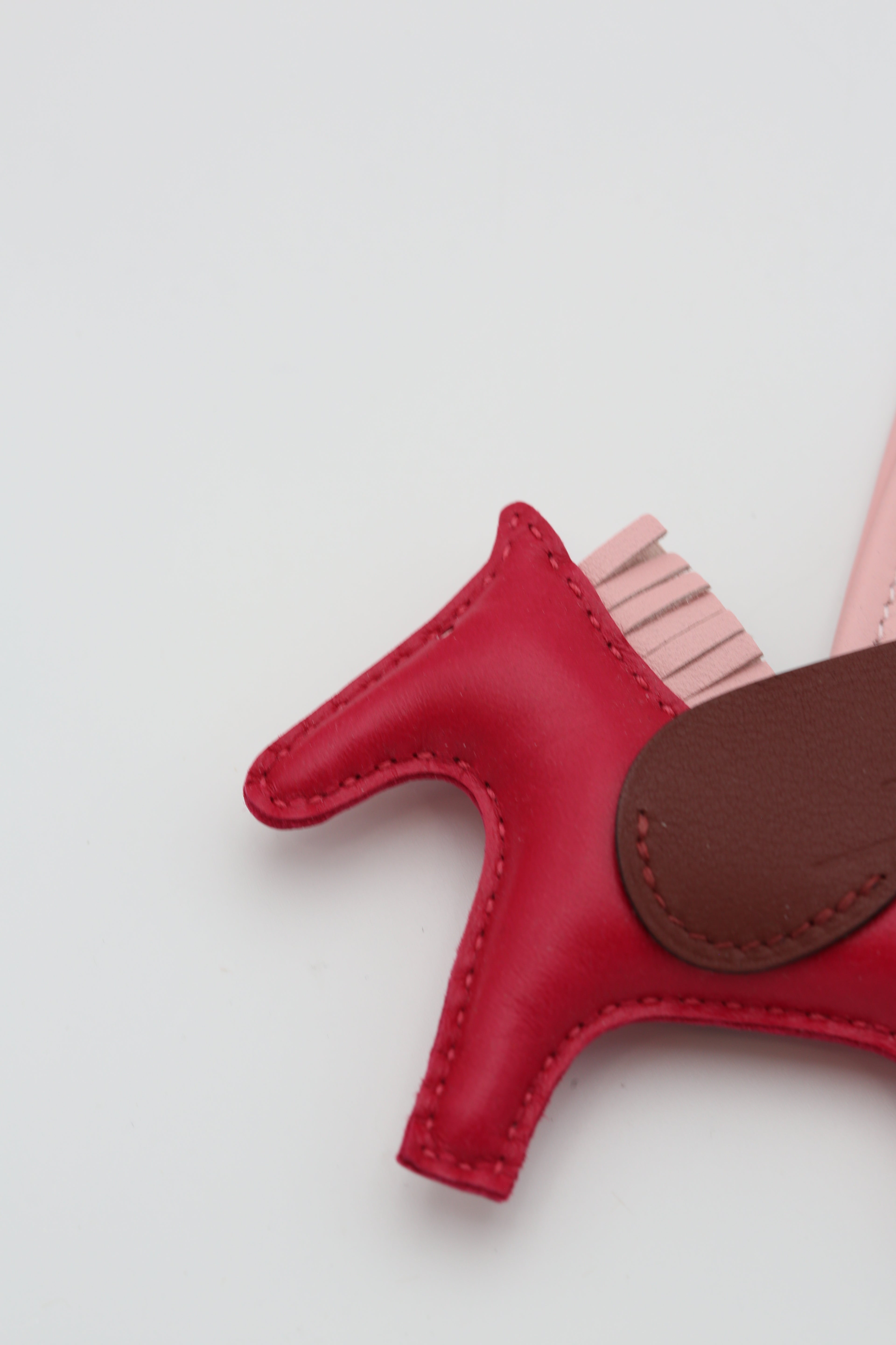 HERMÈS RODEO PEGASE PM CHARM ROSE/GOLD