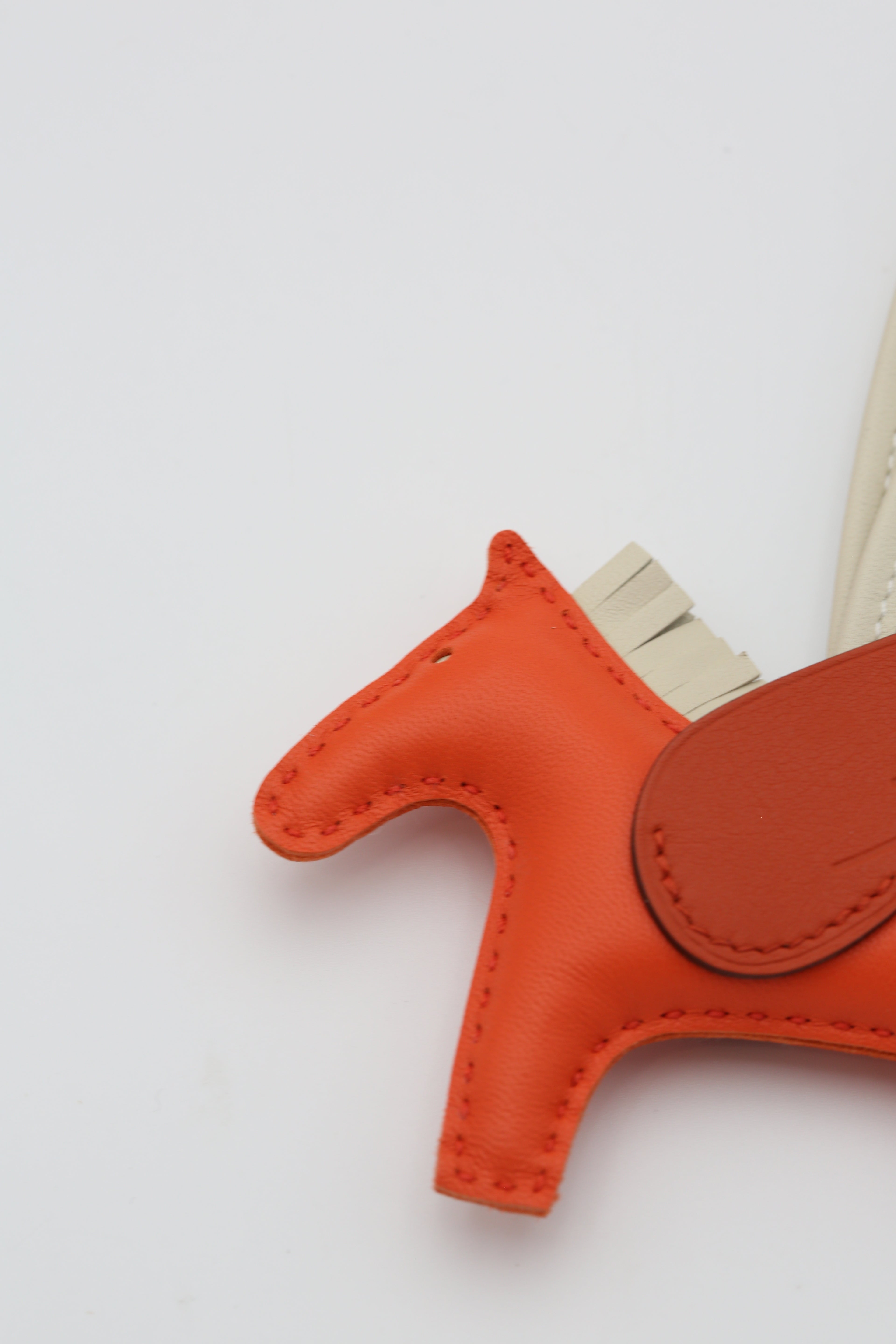 HERMÈS RODEO PEGASE PM CHARM ORANGE/GOLD/CRAIE