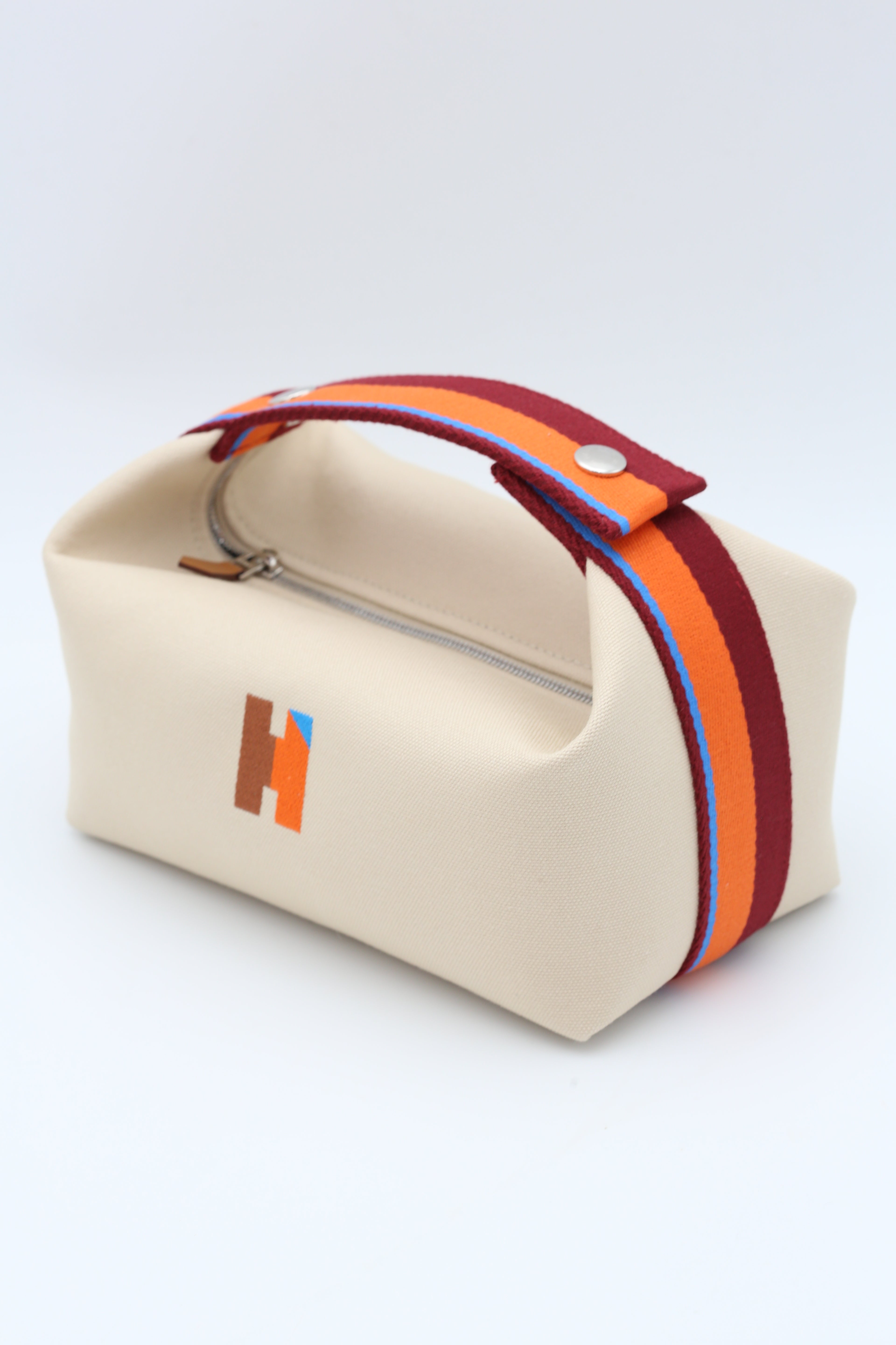 HERMÈS BRIDE-A-BRAC CASE SMALL MODEL NATUREL ORANGE