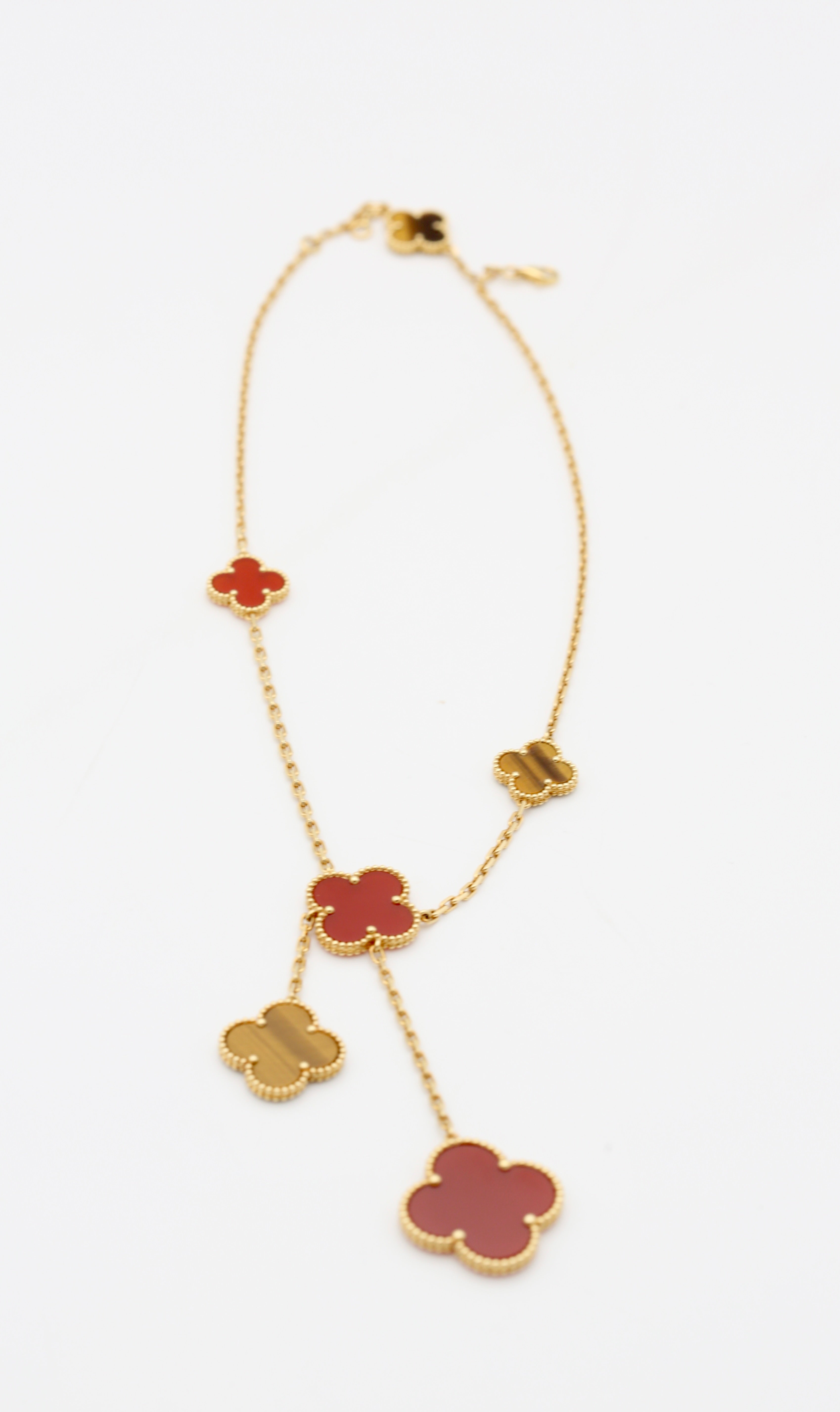 VAN CLEEF & ARPELS MAGIC ALHAMBRA NECKLACE 6 MOTIFS 18K YELLOW GOLD CARNELIAN & TIGER'S EYE