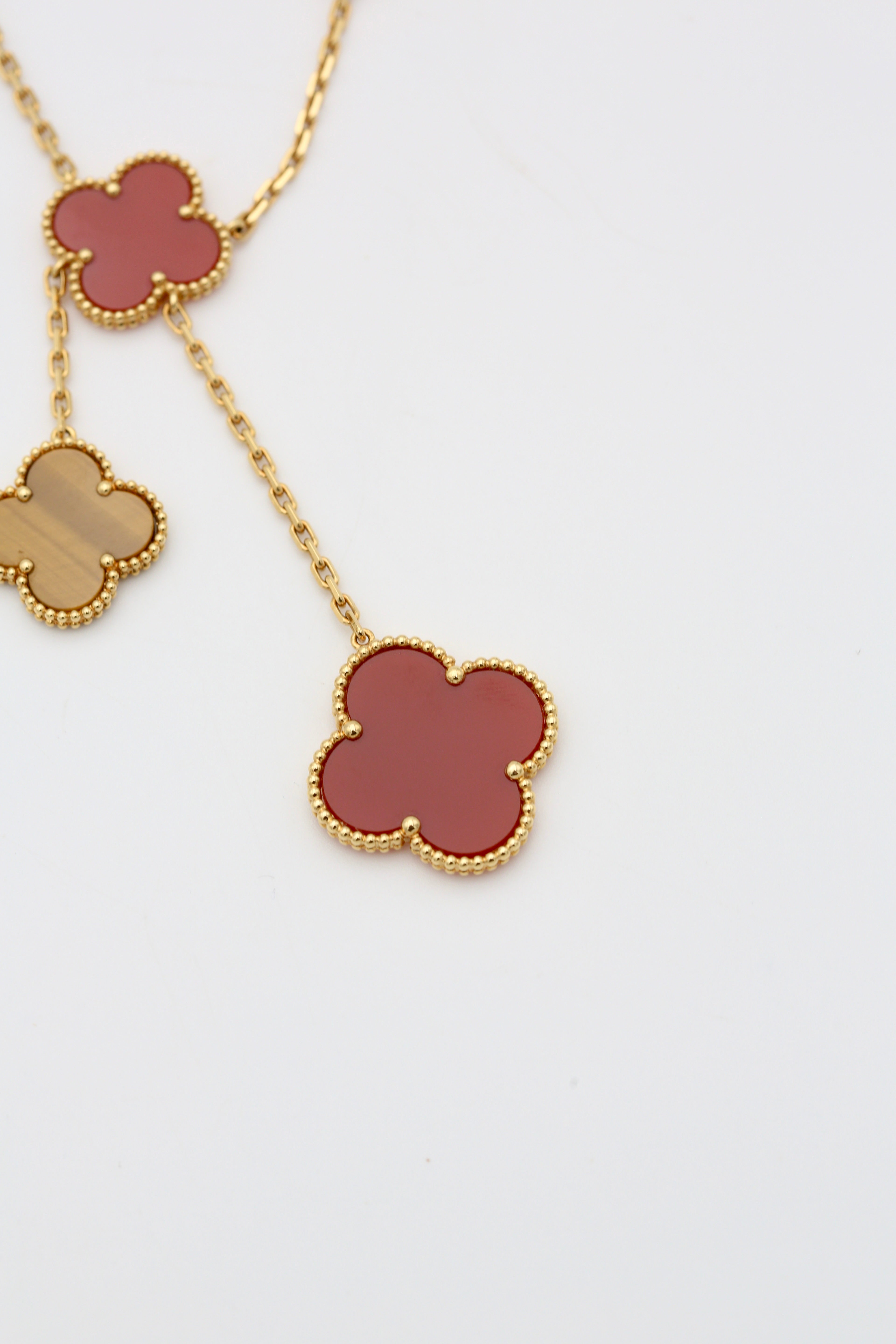 VAN CLEEF & ARPELS MAGIC ALHAMBRA NECKLACE 6 MOTIFS 18K YELLOW GOLD CARNELIAN & TIGER'S EYE