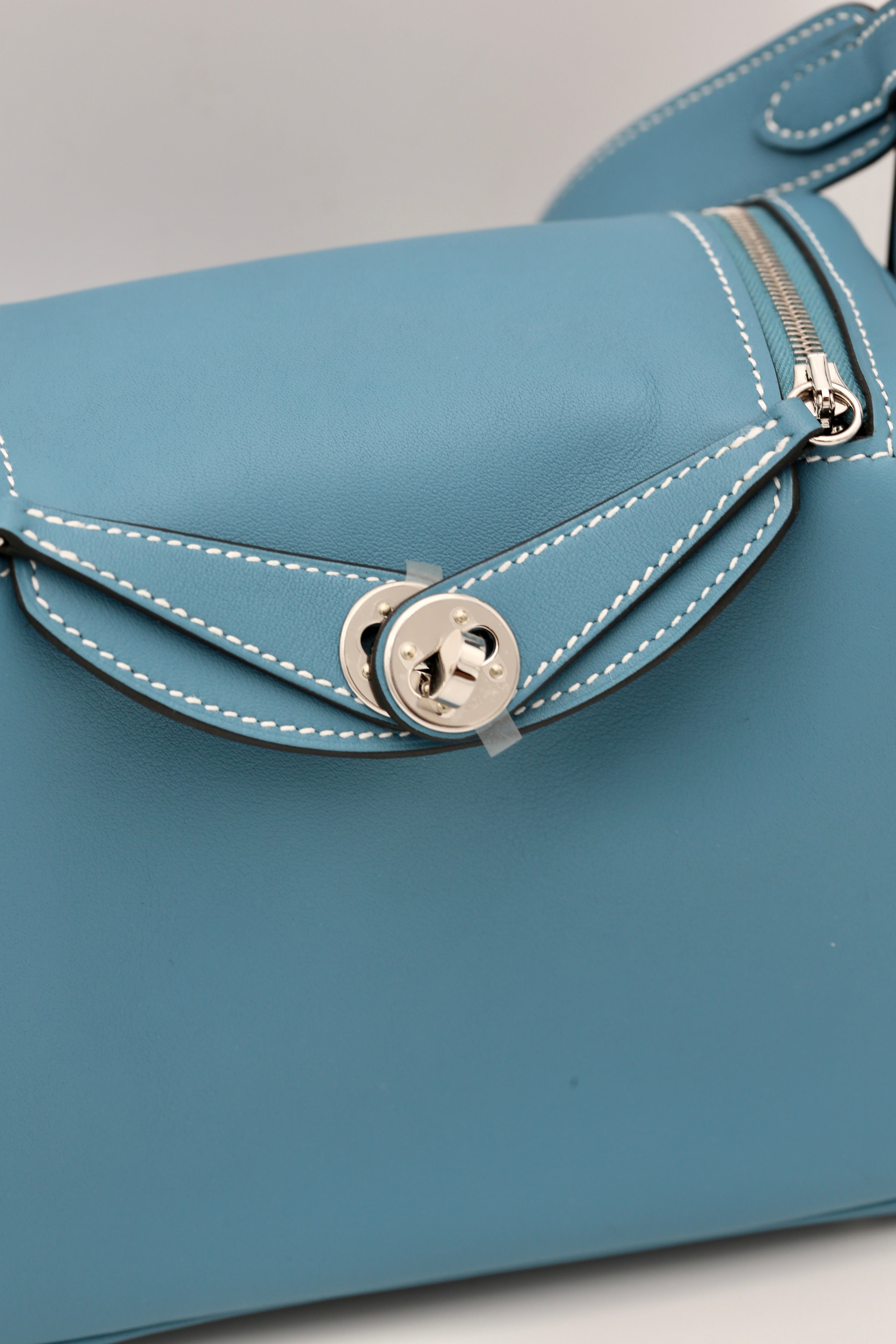 HERMÈS MINI LINDY BLEU JEAN SWIFT SILVER HARDWARE K STAMP