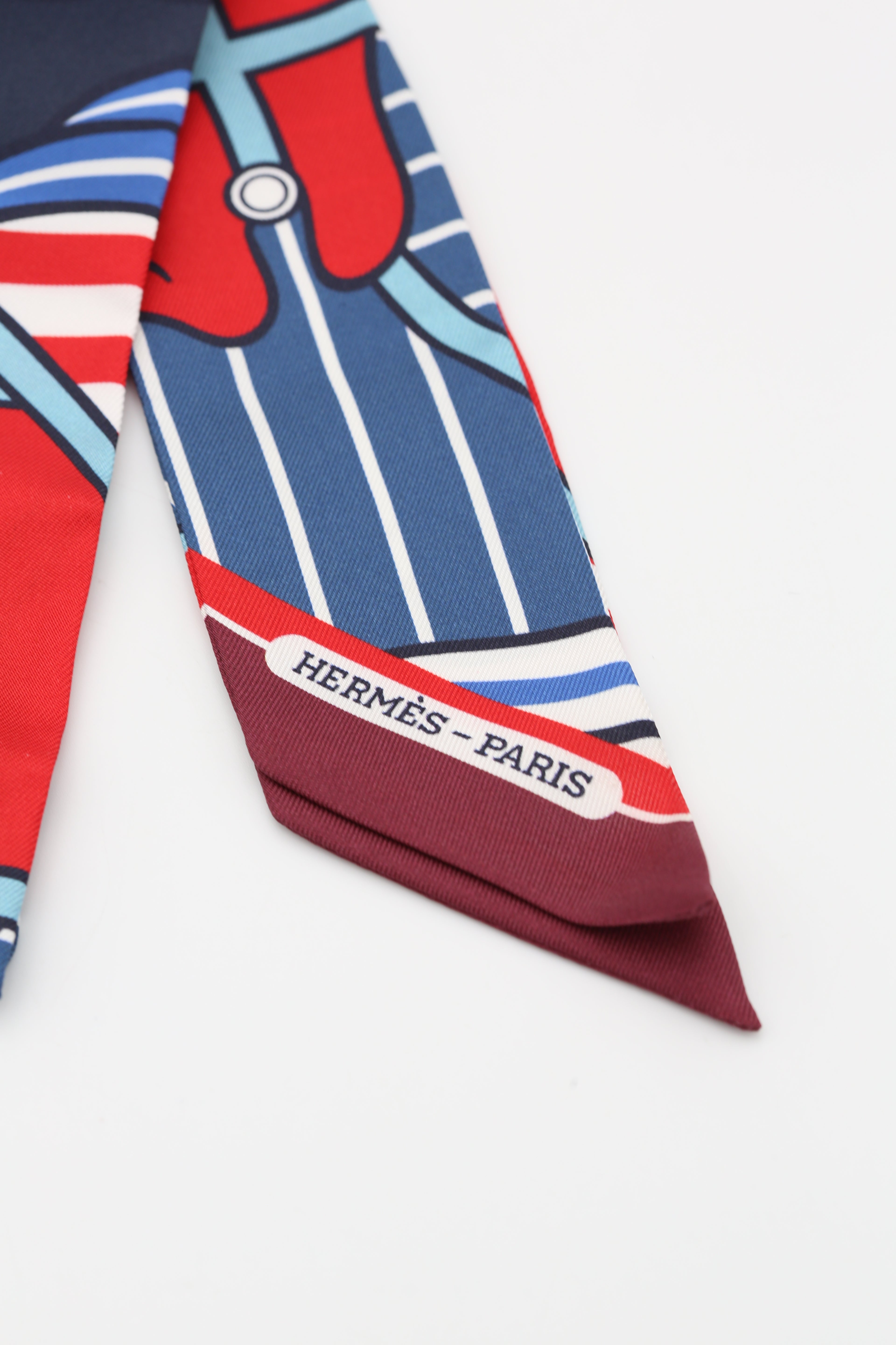 HERMÈS TWILLY QUADRIGE BAYADERE CL/ROUGE/BLEU/BLANC