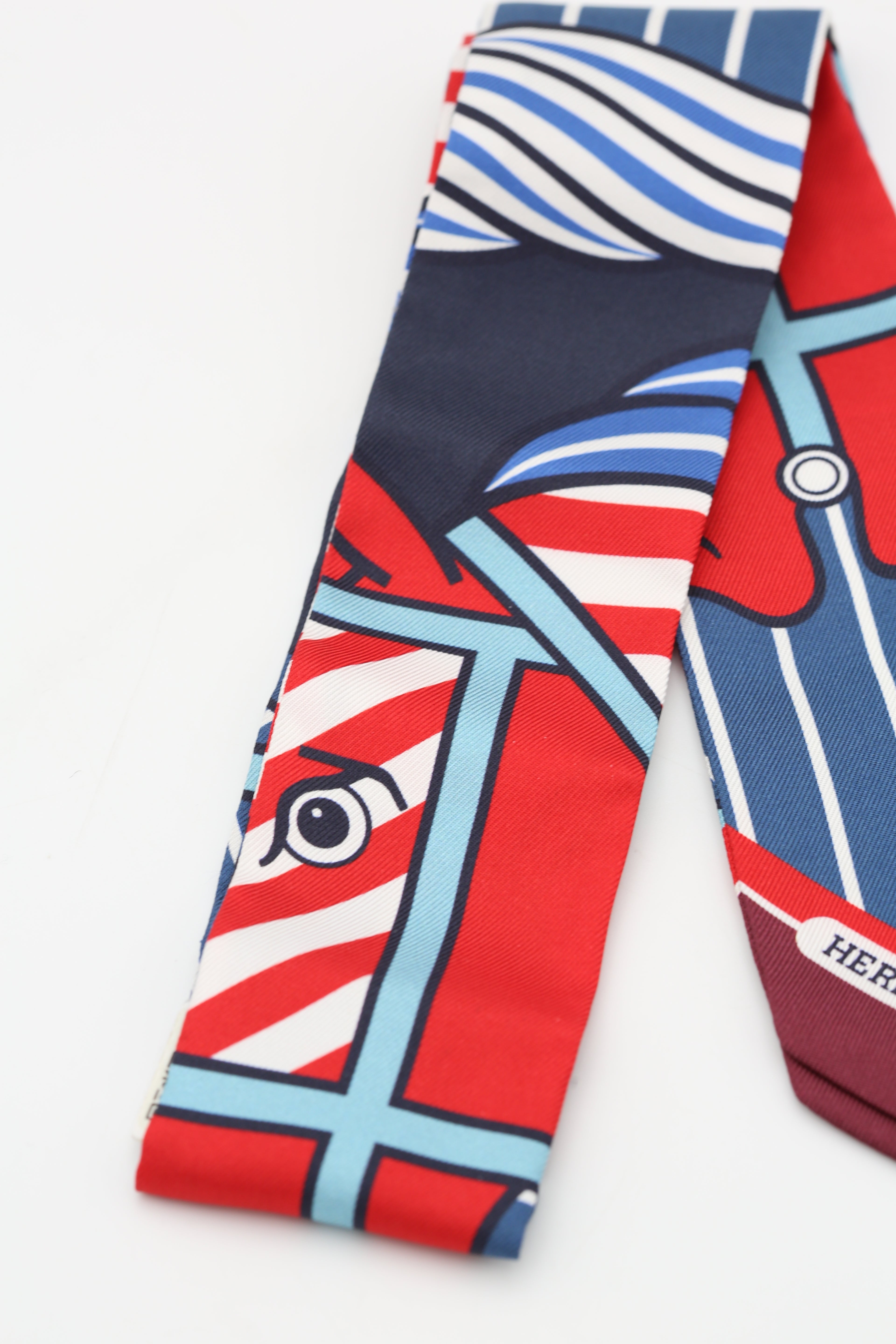 HERMÈS TWILLY QUADRIGE BAYADERE CL/ROUGE/BLEU/BLANC