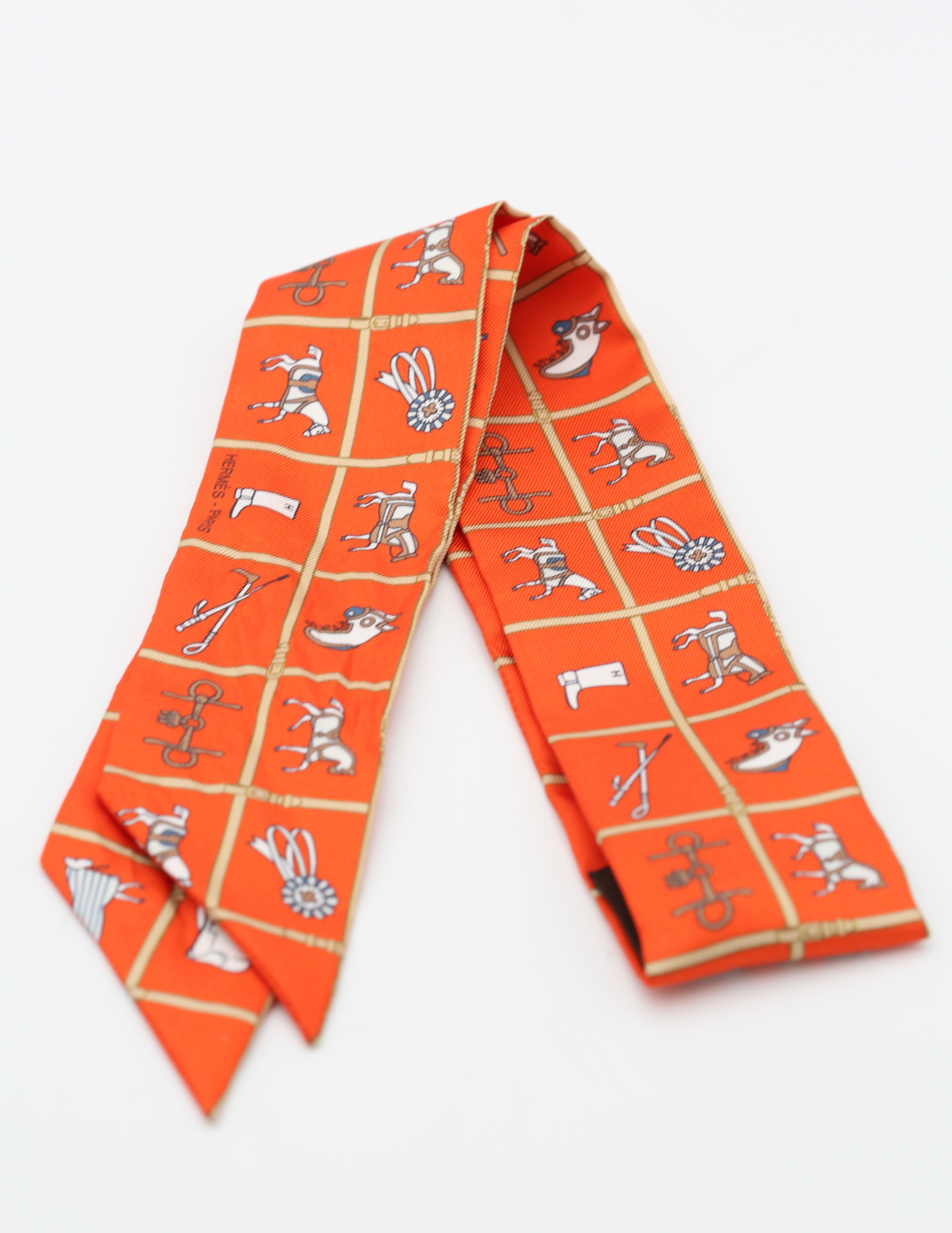 HERMÈS TWILLY ORANGE/MULTICOLOR