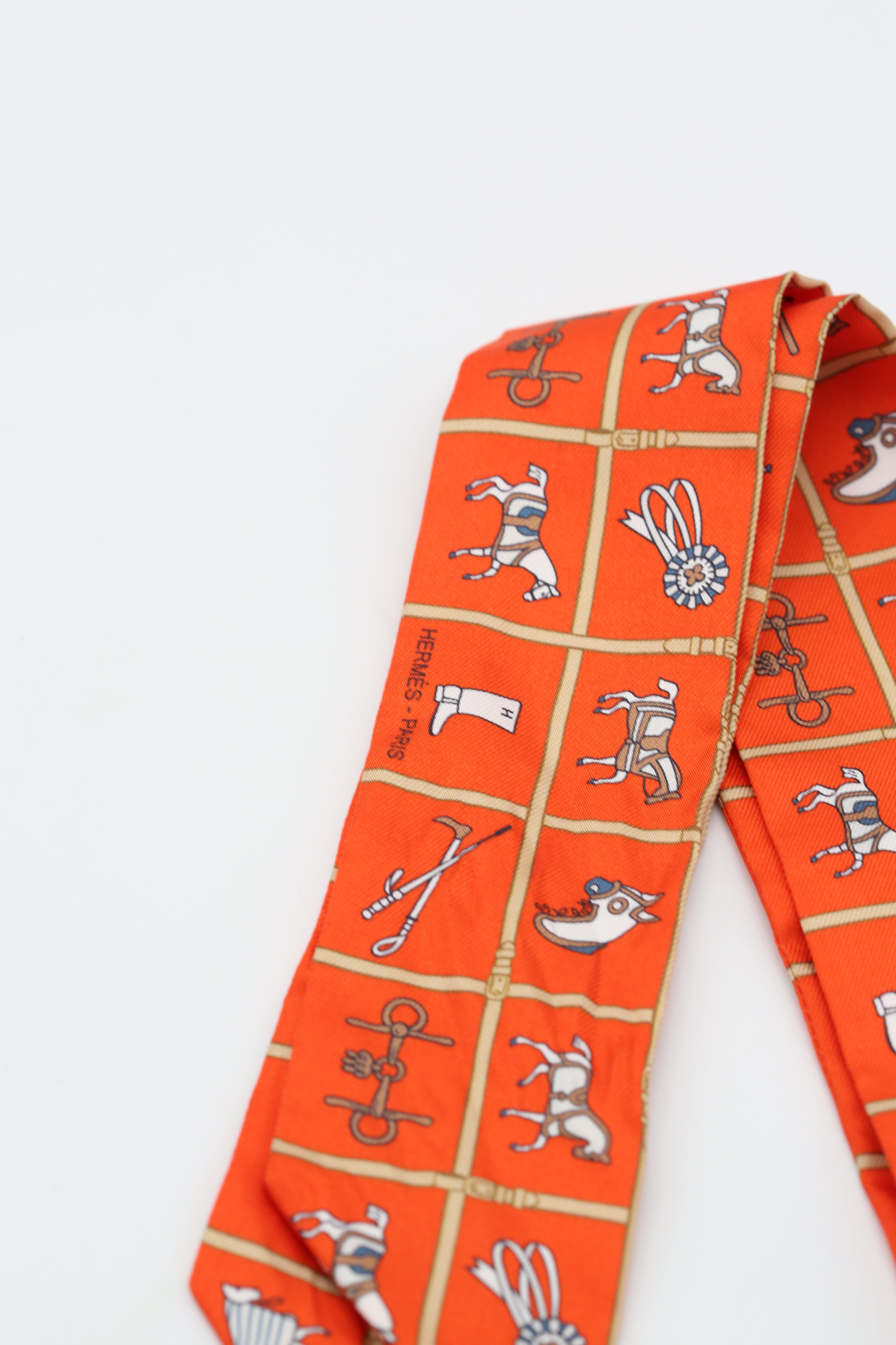 HERMÈS TWILLY ORANGE/MULTICOLOR