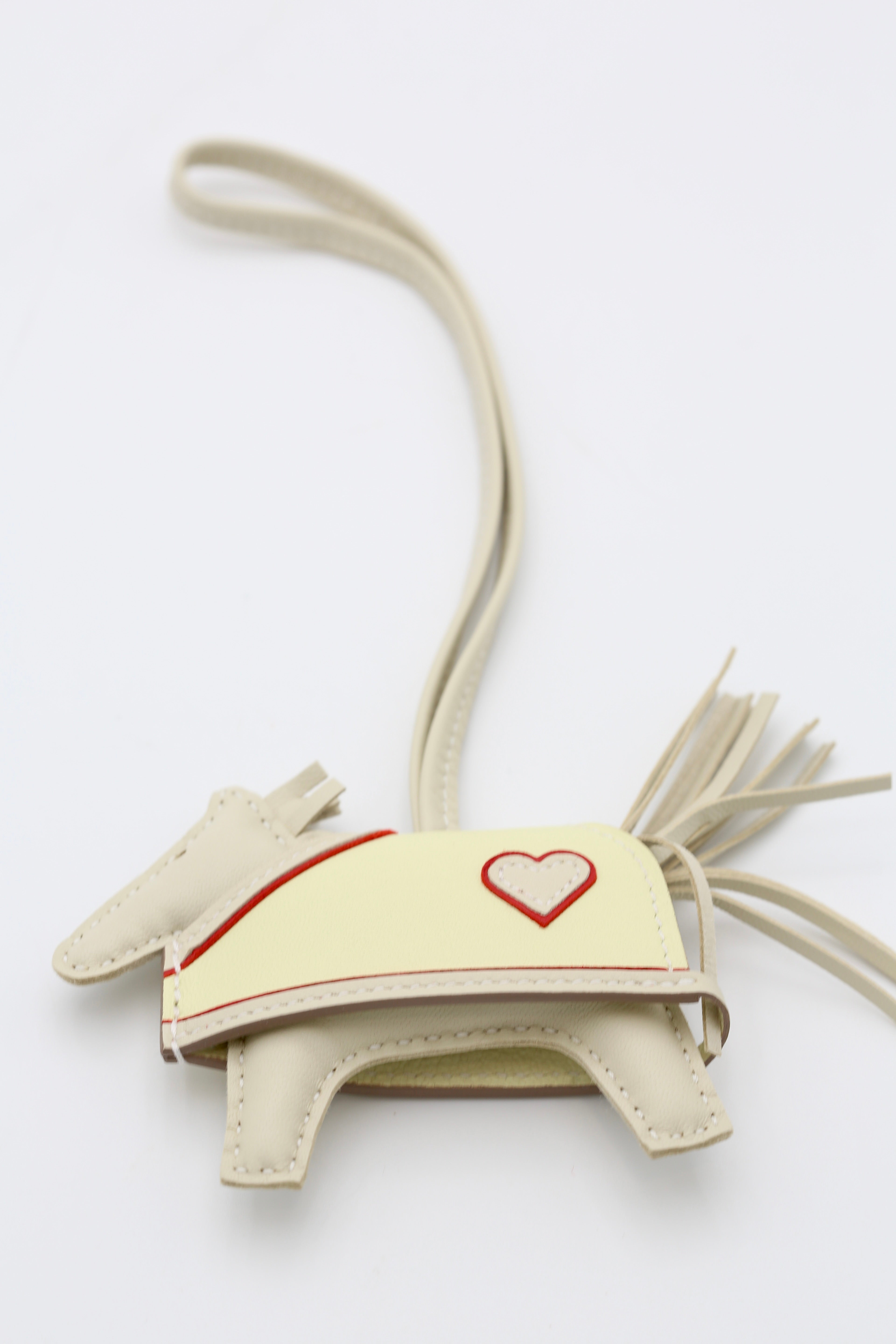 HERMÈS RODEO BAG CHARM CRAIE WITH HEARTS PATTERN
