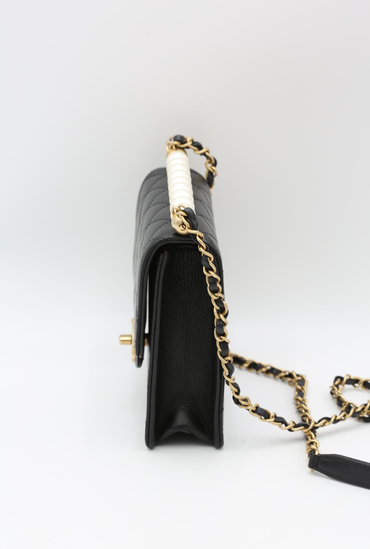 CHANEL BLACK QUILTED MINI BAG WITH PEARL HANDLE