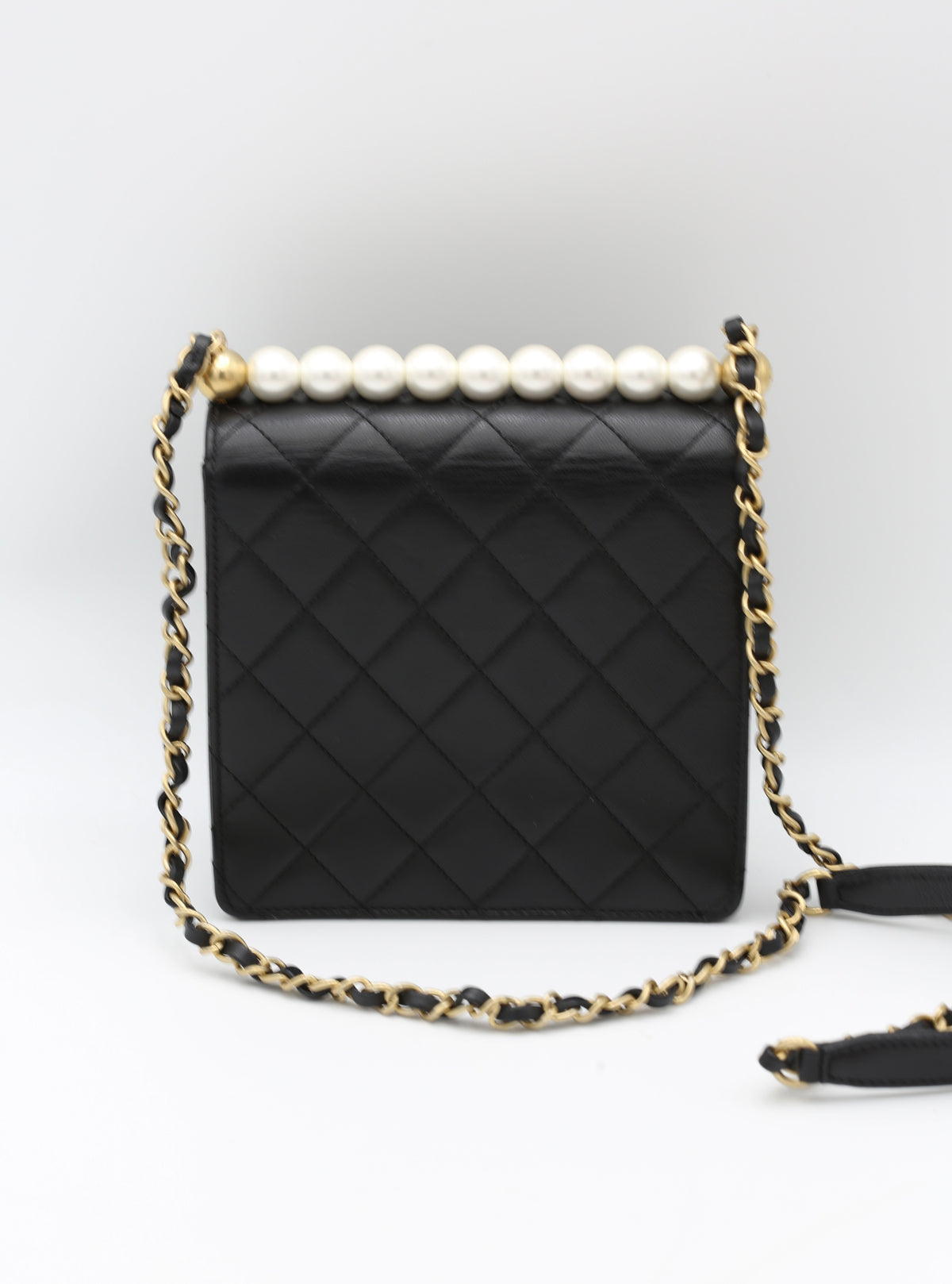 CHANEL BLACK QUILTED MINI BAG WITH PEARL HANDLE