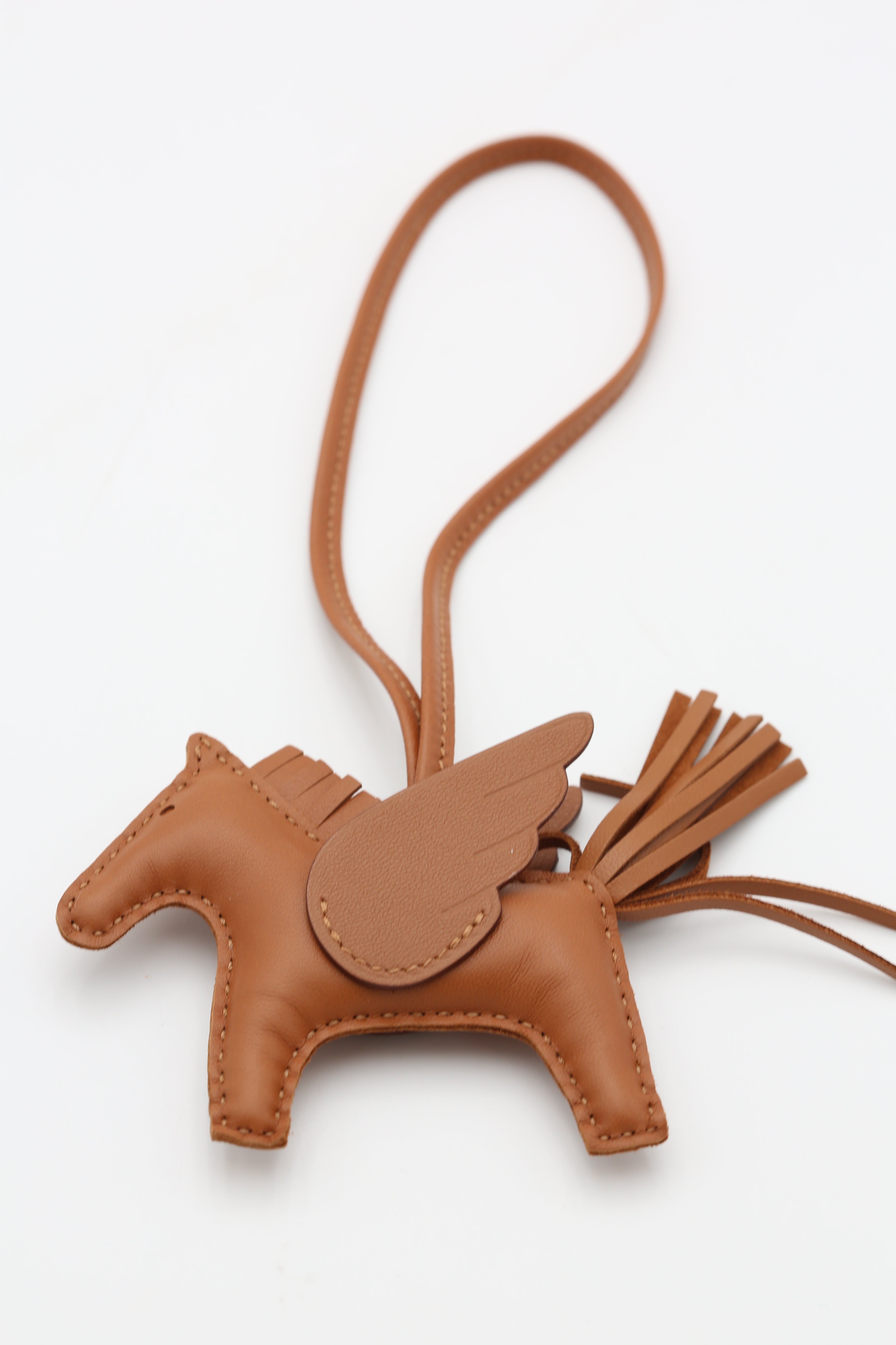HERMÈS RODEO PEGASE PM CHARM GOLD